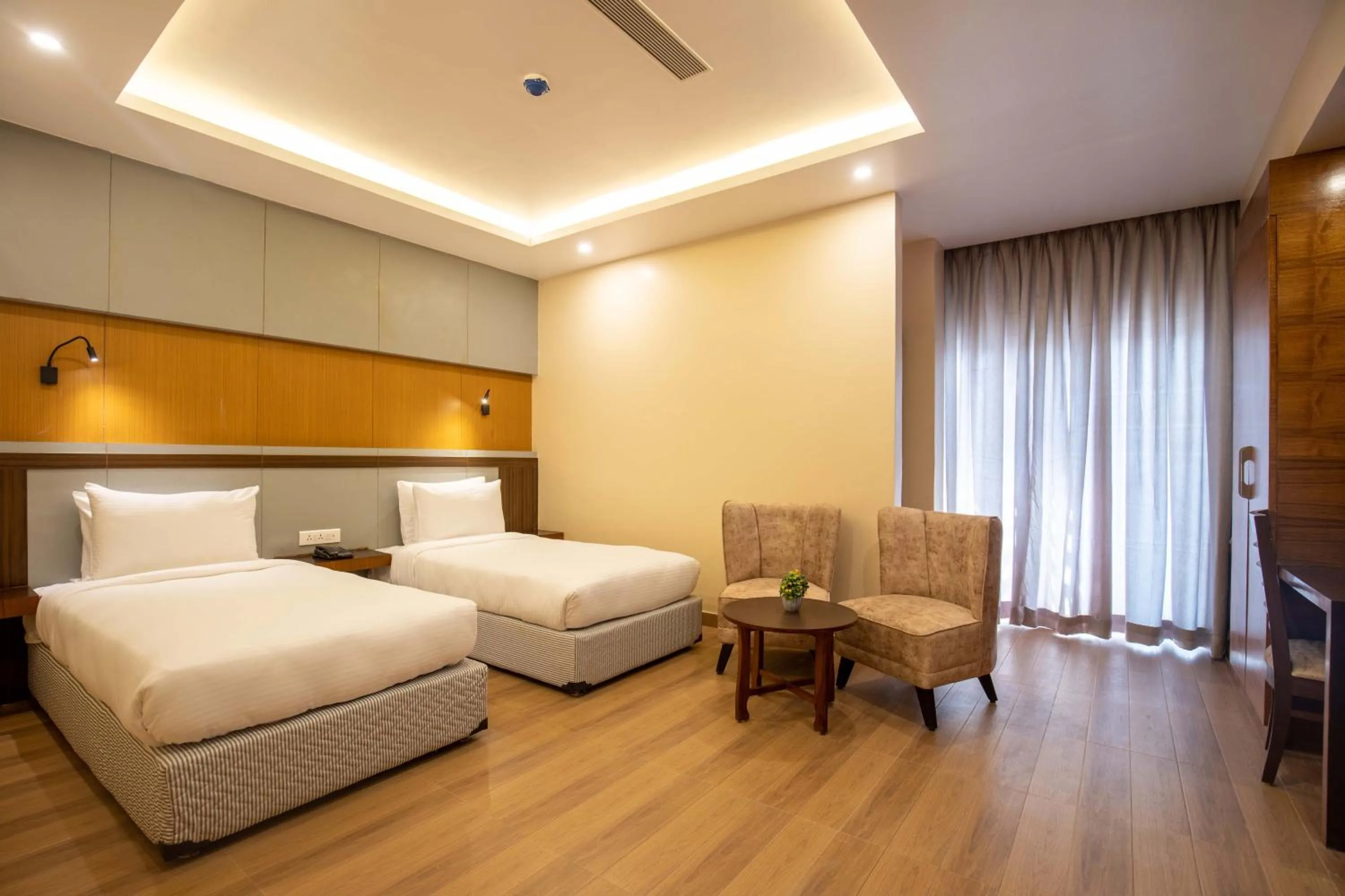 Bed in Hotel Palm International