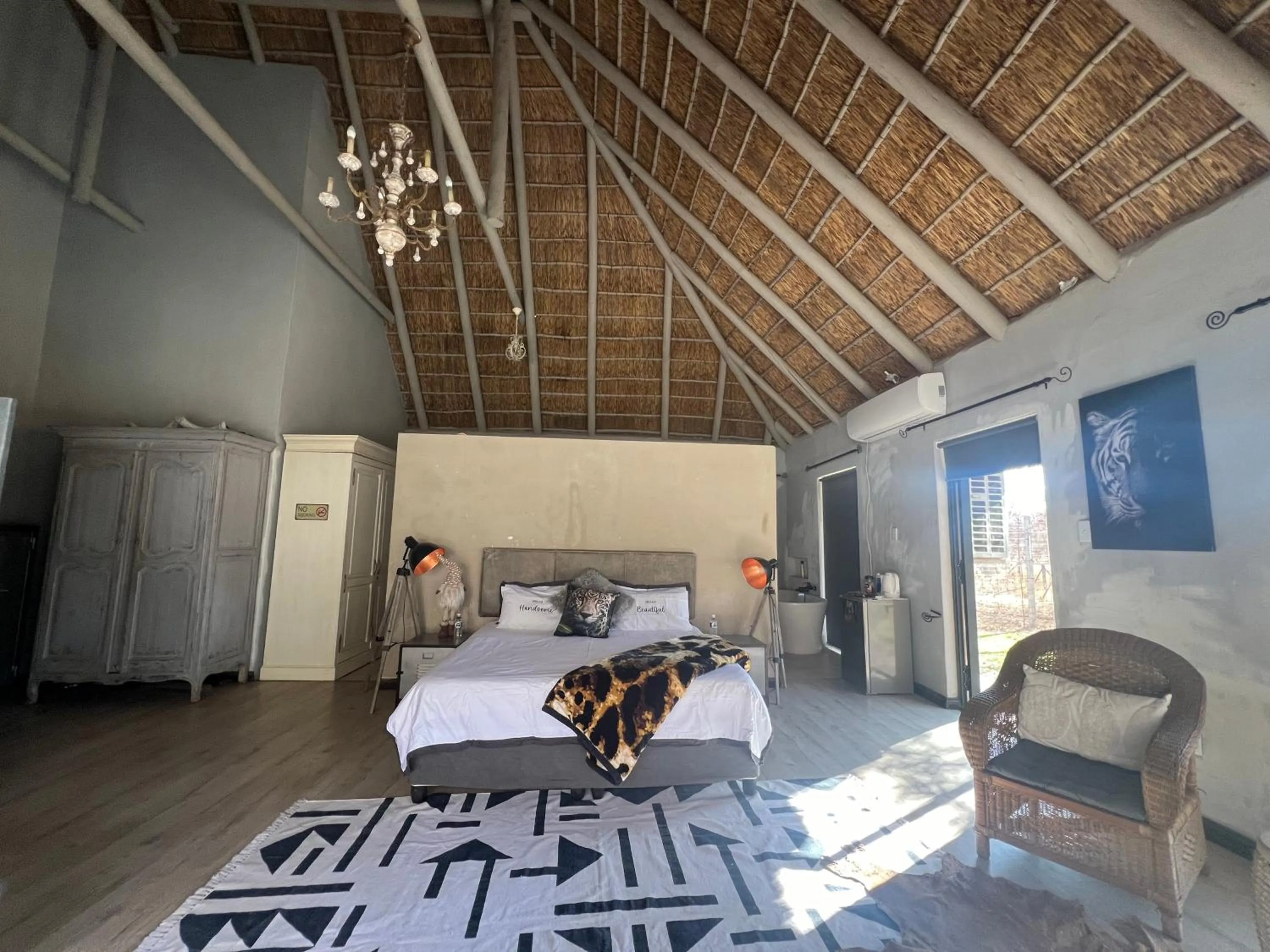 Bed in Simba Safaris African Pride Exotic Lodge