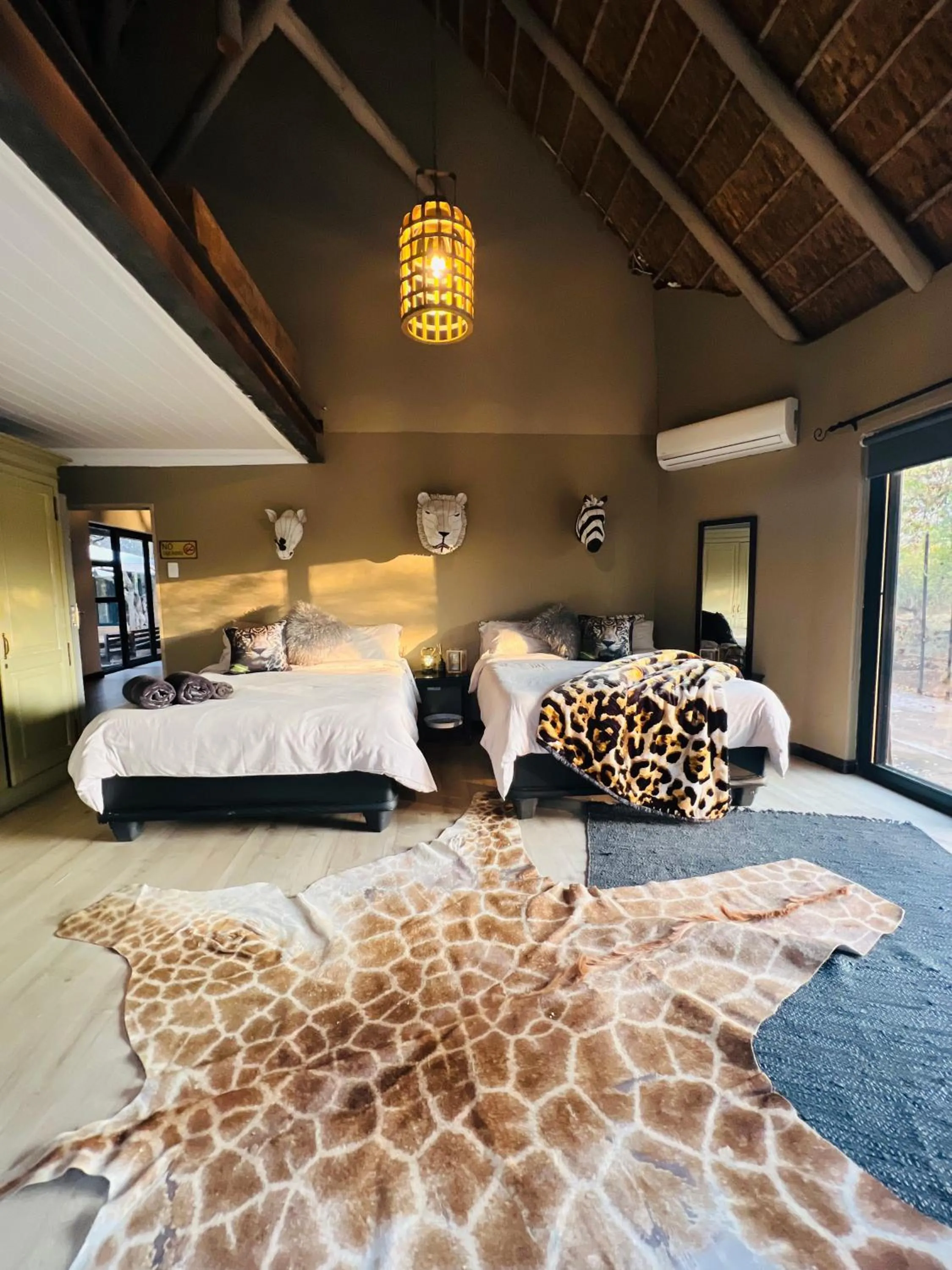 Bed in Simba Safaris African Pride Exotic Lodge