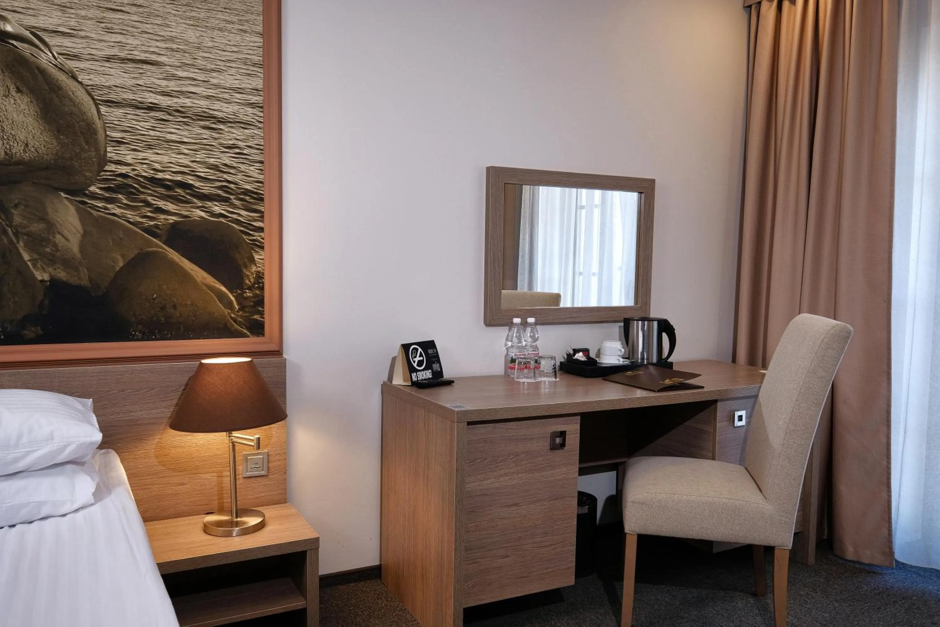 Coffee/tea facilities, Bed in Rius Hotel Lviv