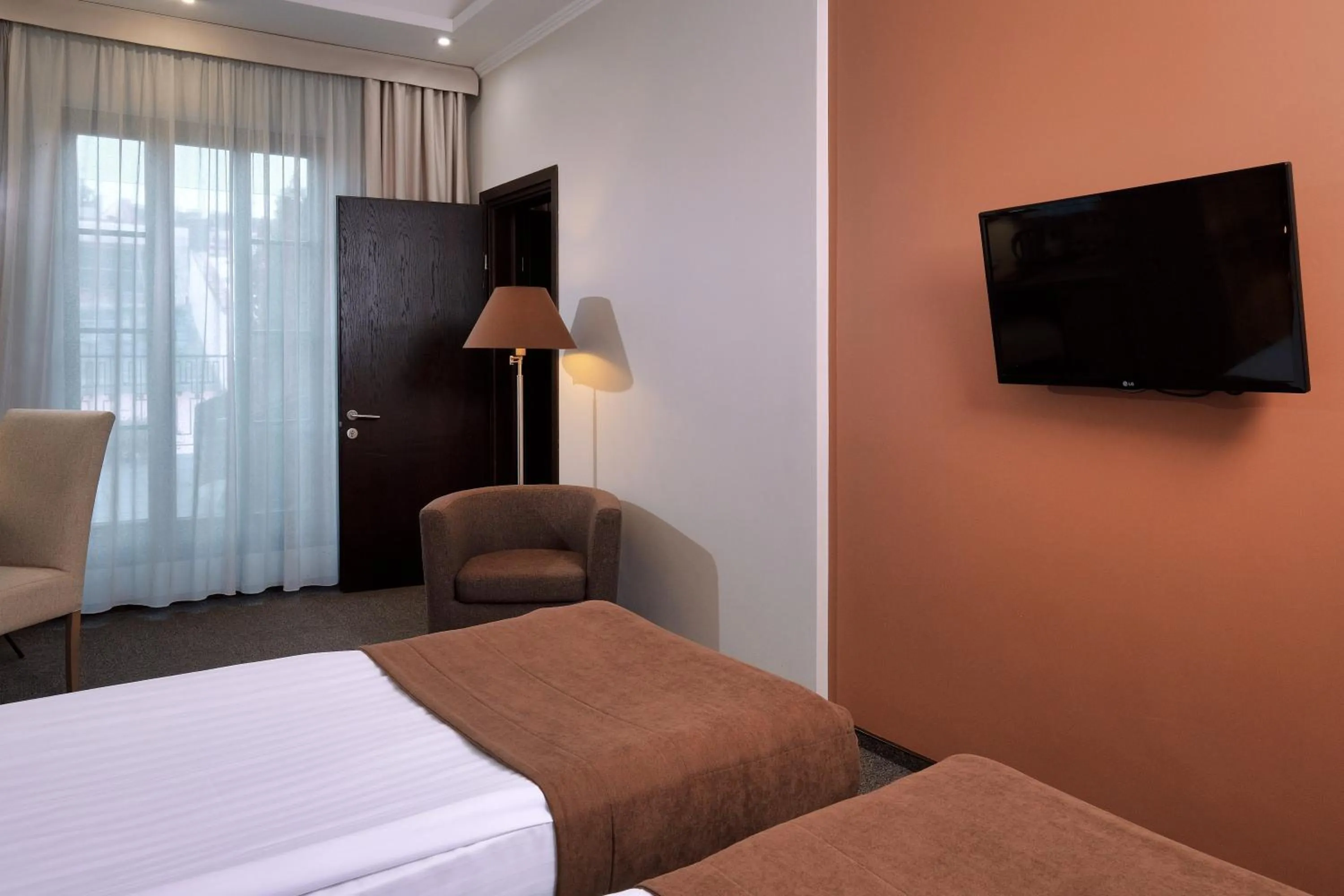 Photo of the whole room, Bed in Rius Hotel Lviv