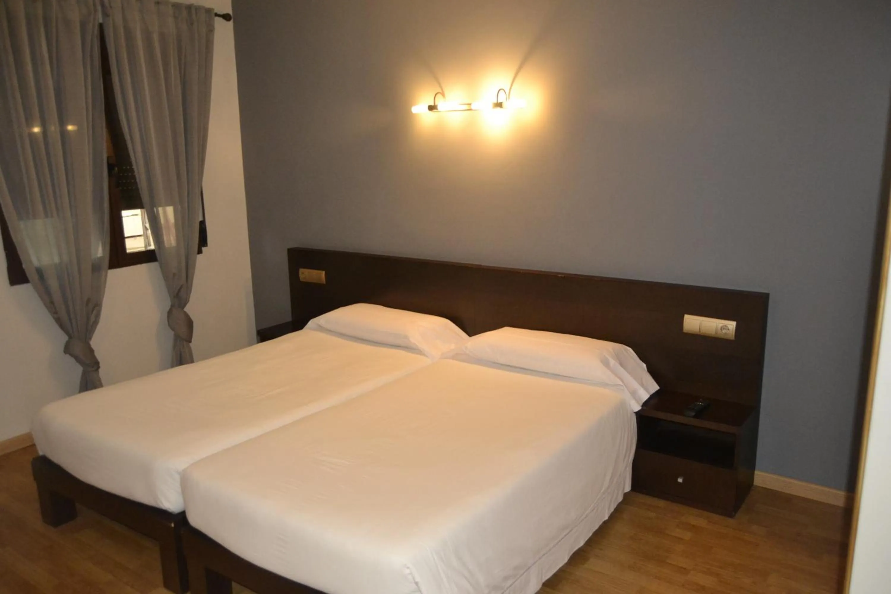 Bed in Hotel El Tratado