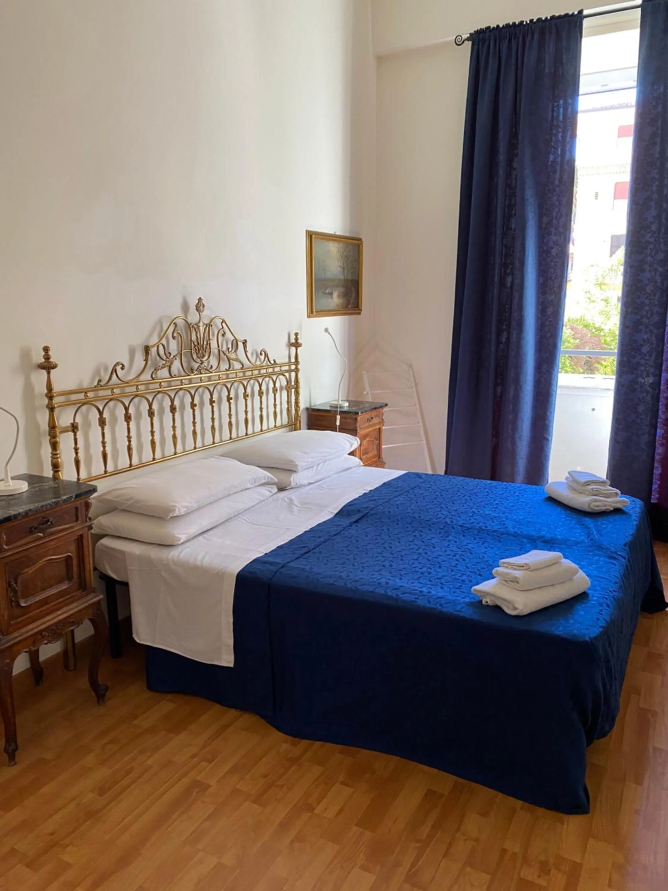 Bed in Otium Maecenatis Apartments