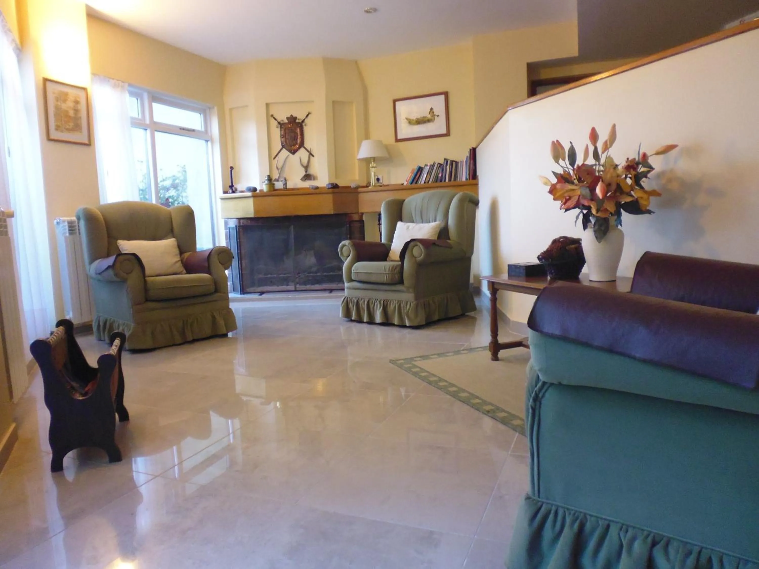 Communal lounge/ TV room in Estancia La Quinta