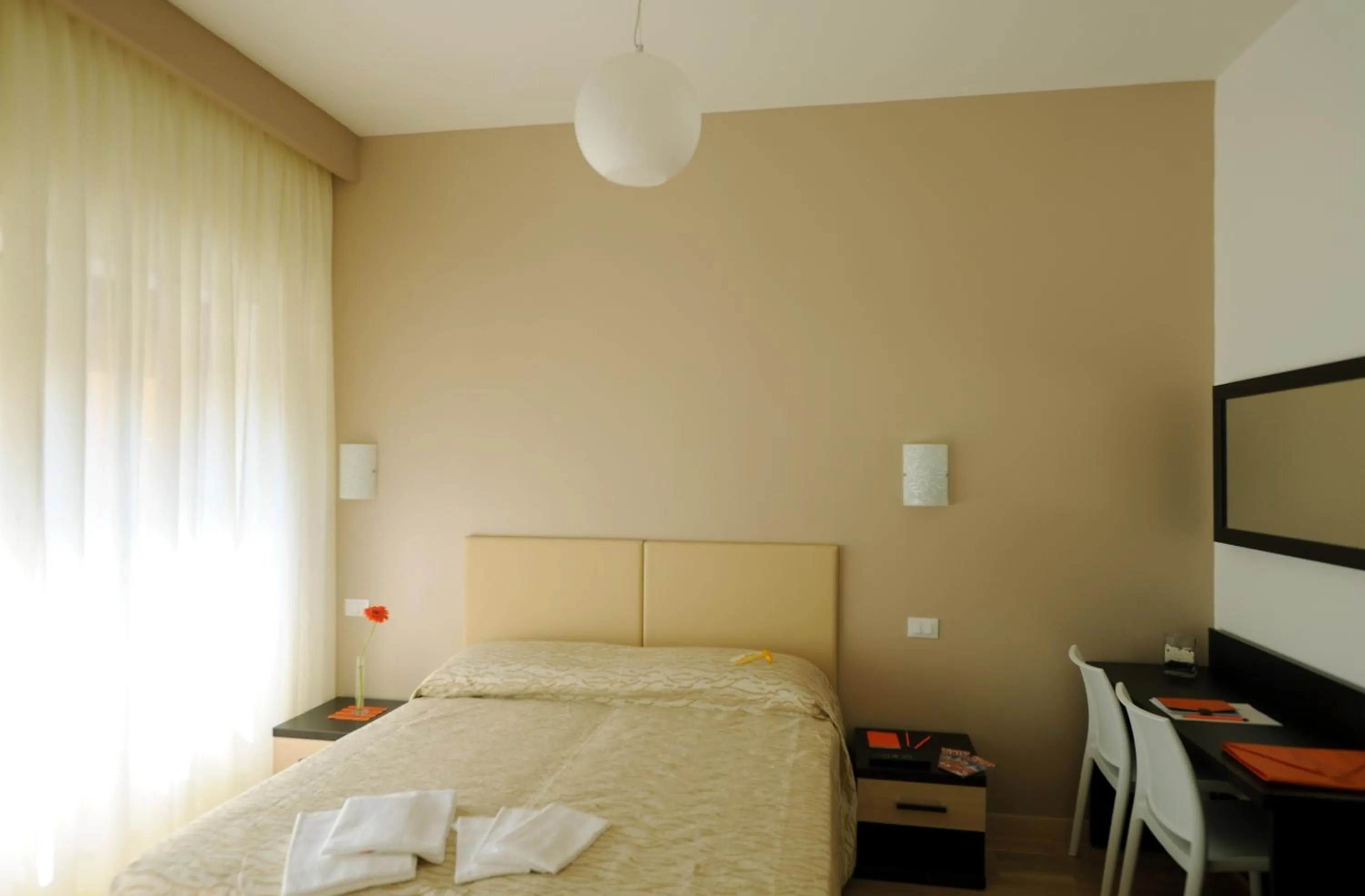 Bedroom, Bed in Honey Rooms