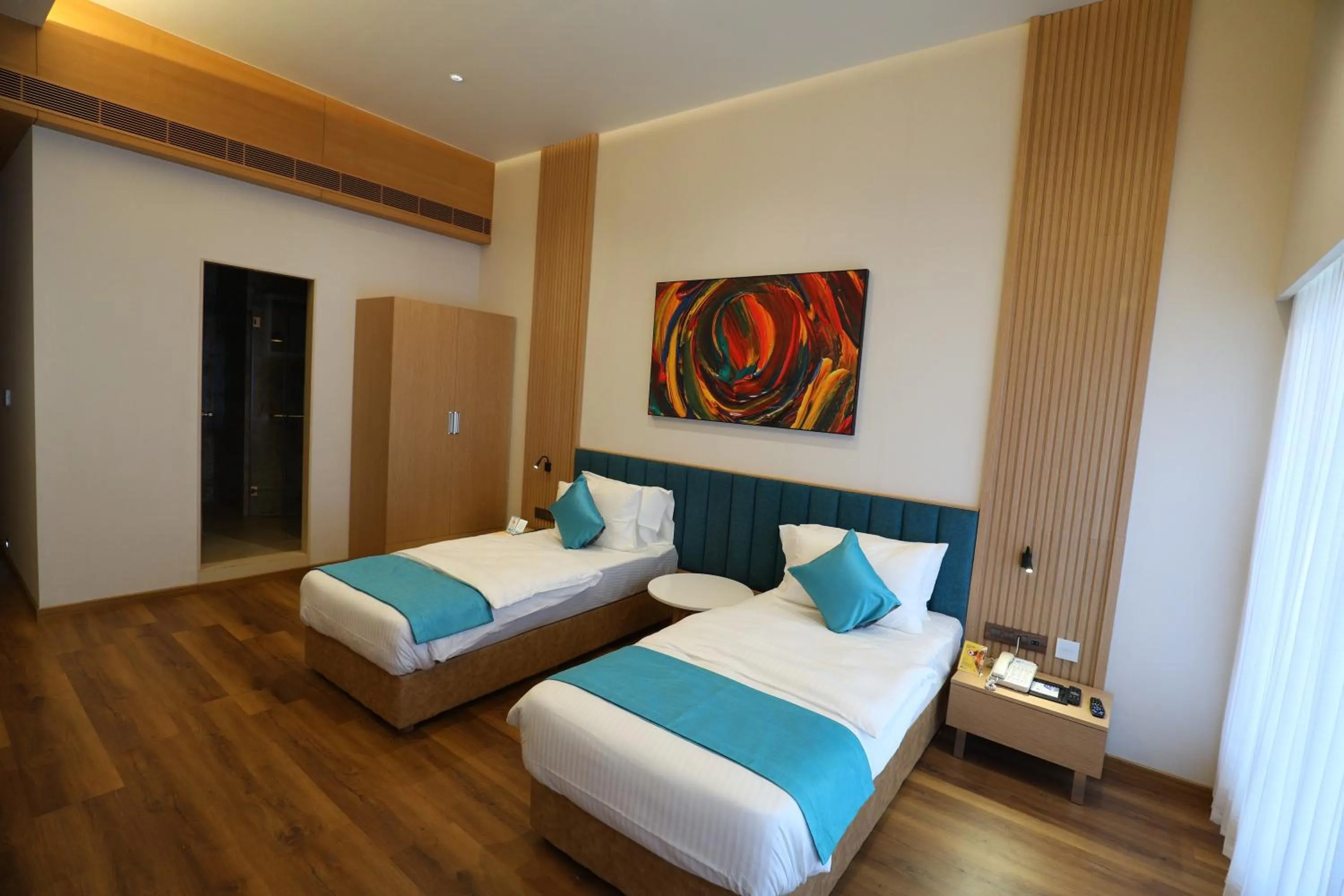 Bed in Hotel Blueivy Anand