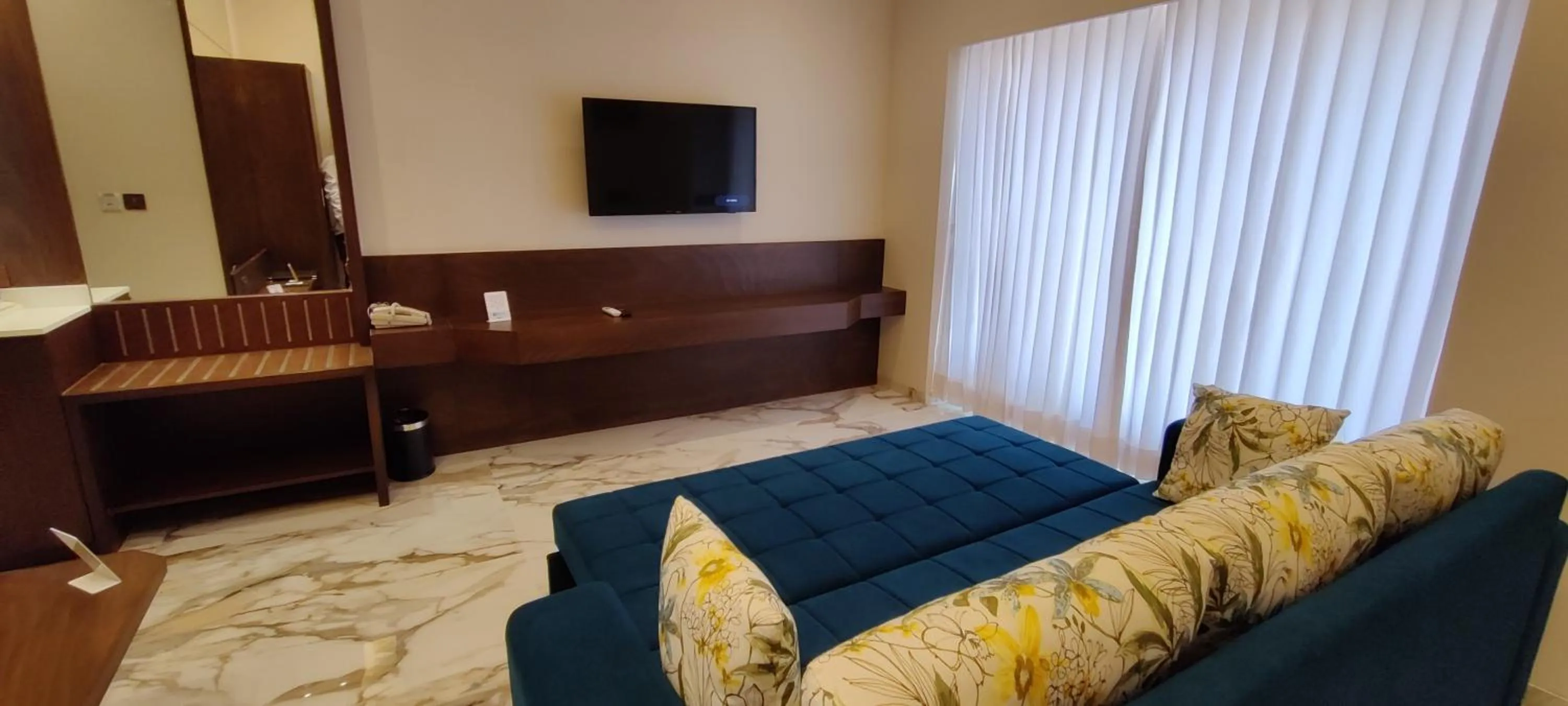 Bed in Hotel Blueivy Anand