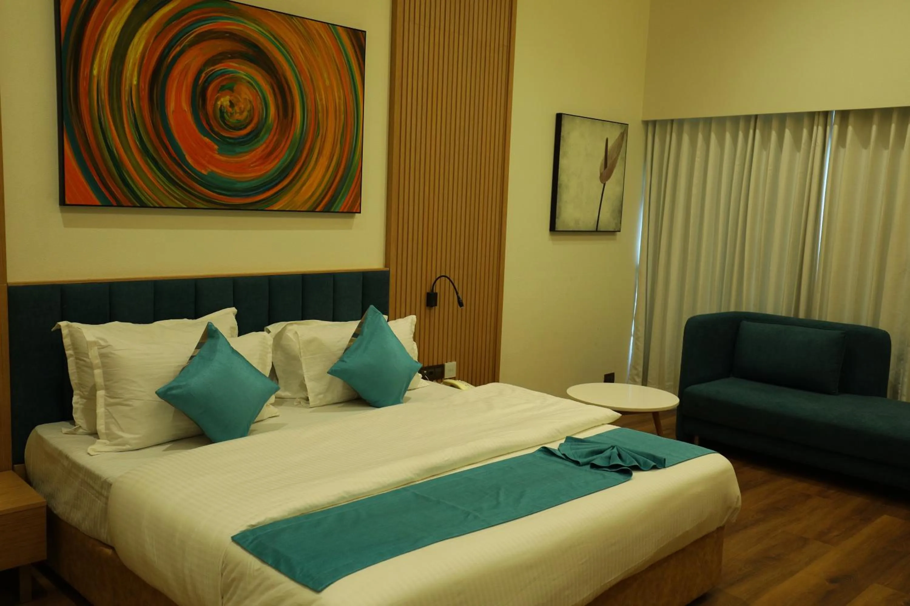Bed in Hotel Blueivy Anand