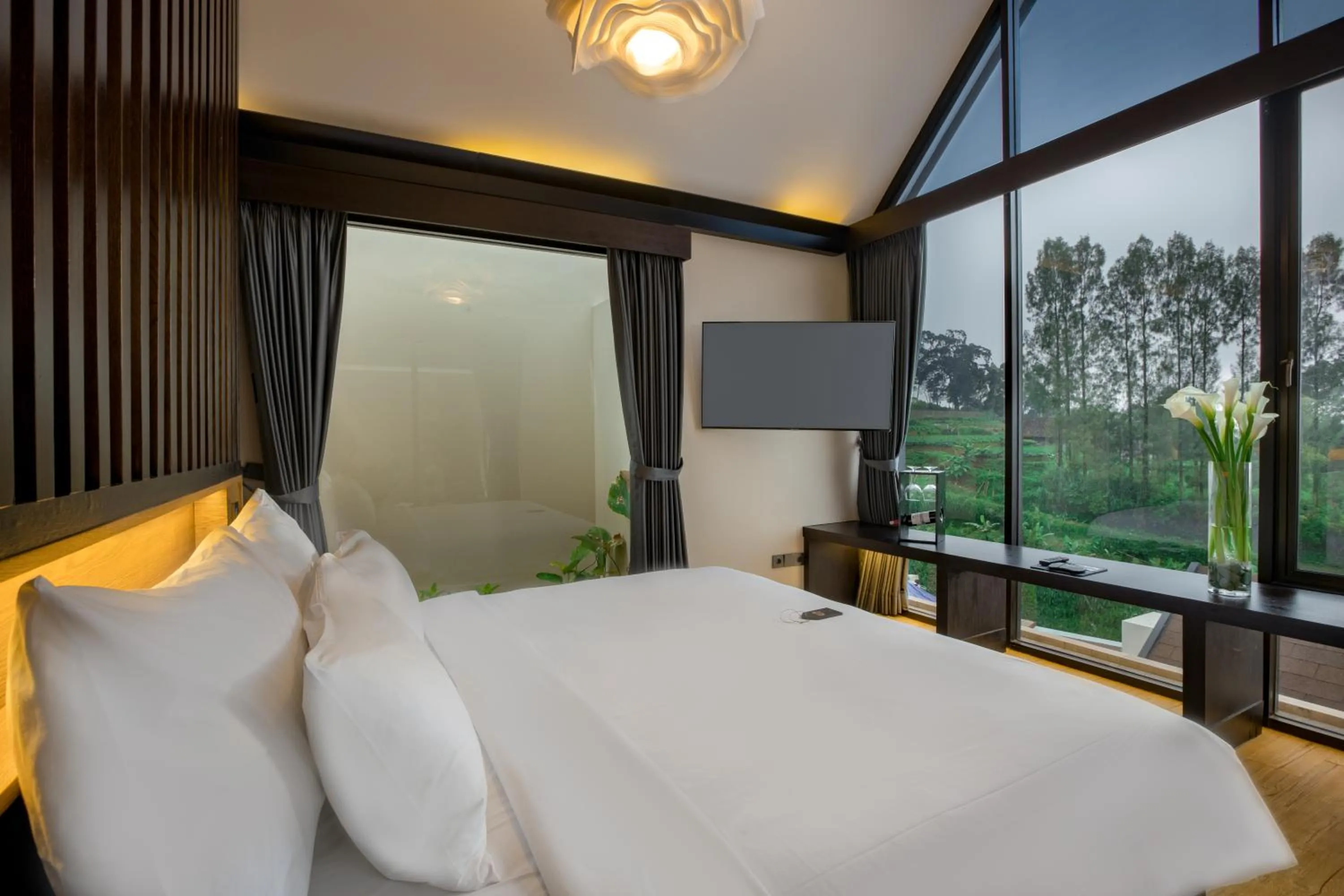 Bedroom, Bed in Sunsetfalls Gardens and Resort