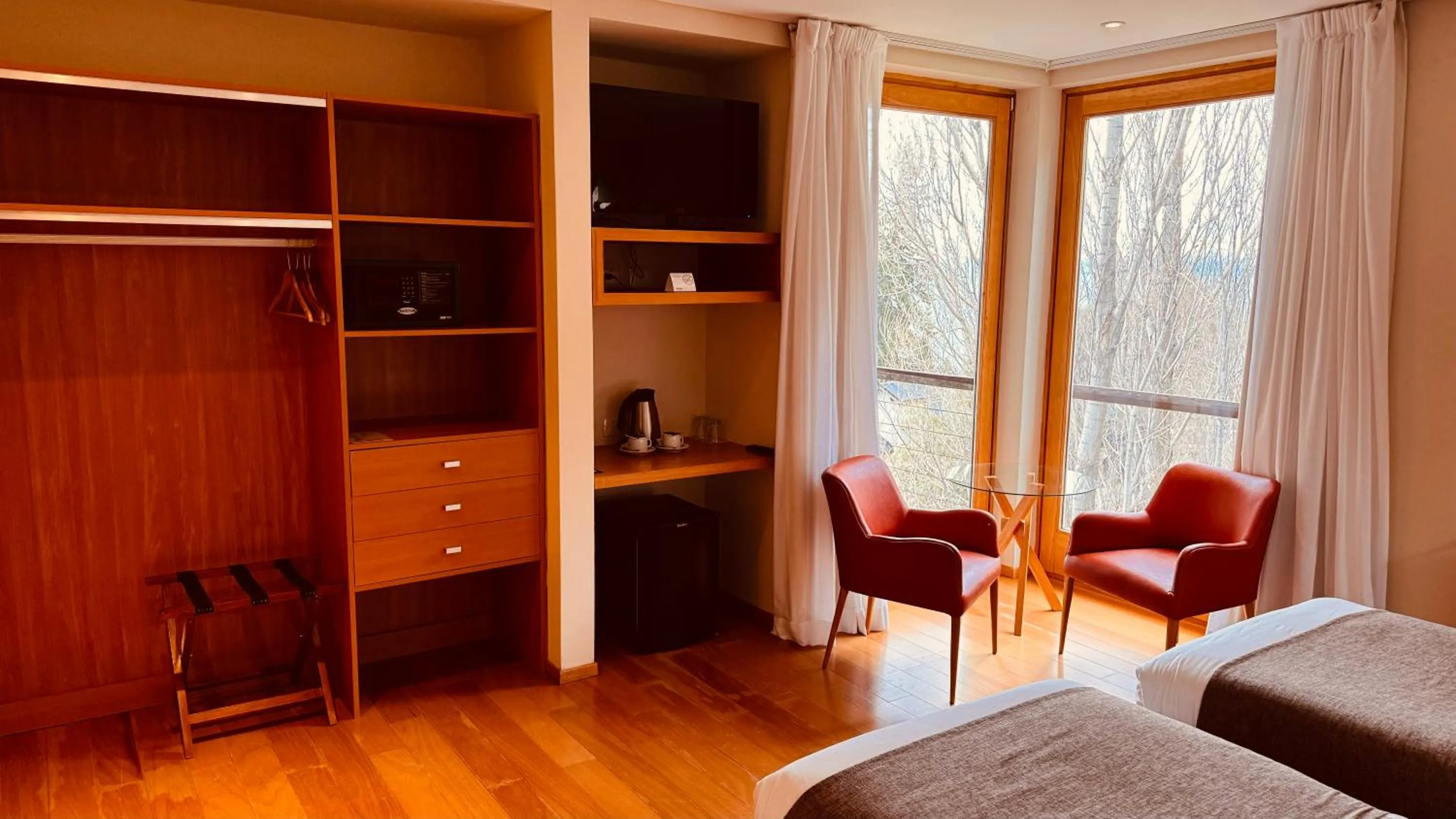 Photo of the whole room, Bed in Design Suites Bariloche