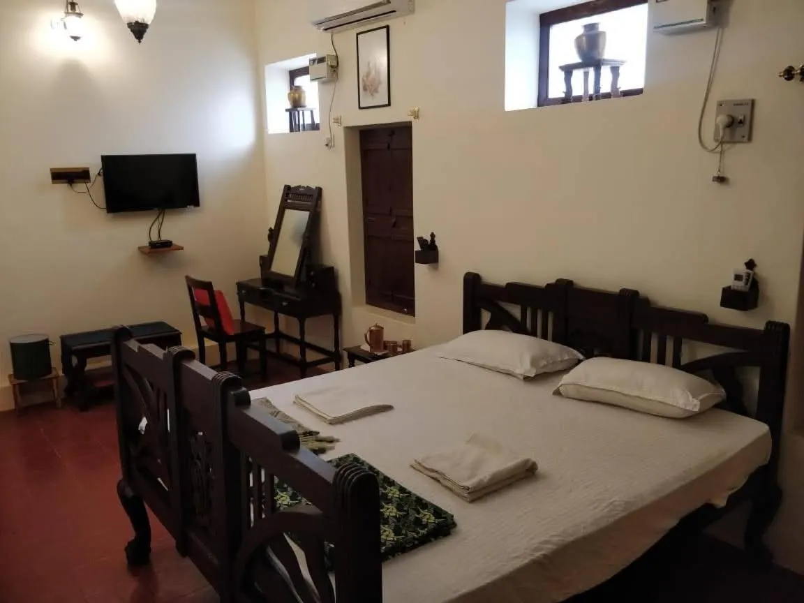 Bed in TANJORE INN