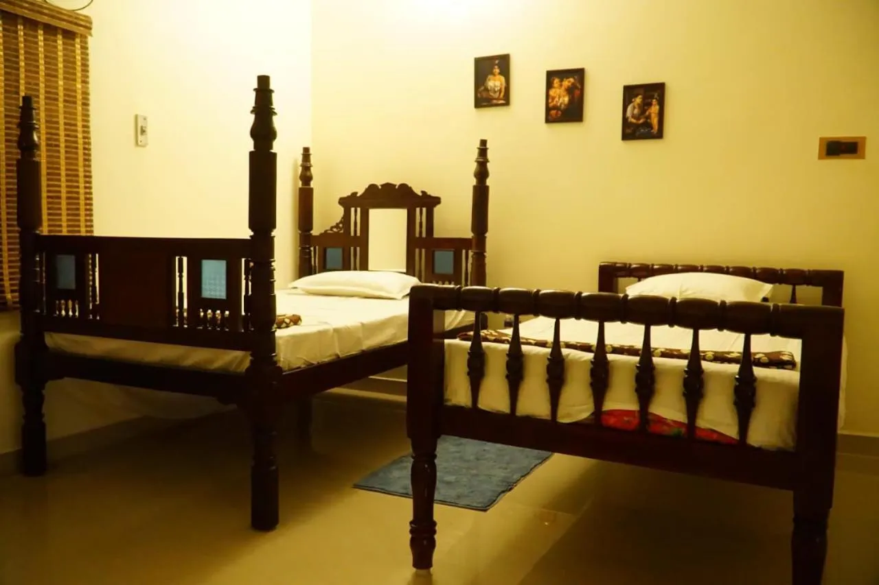 Bed in TANJORE INN