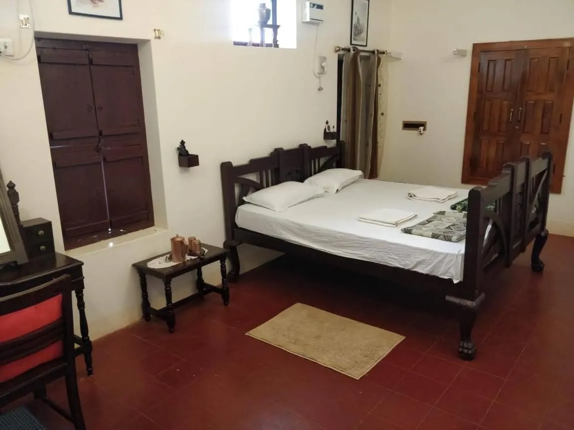 Bed in TANJORE INN