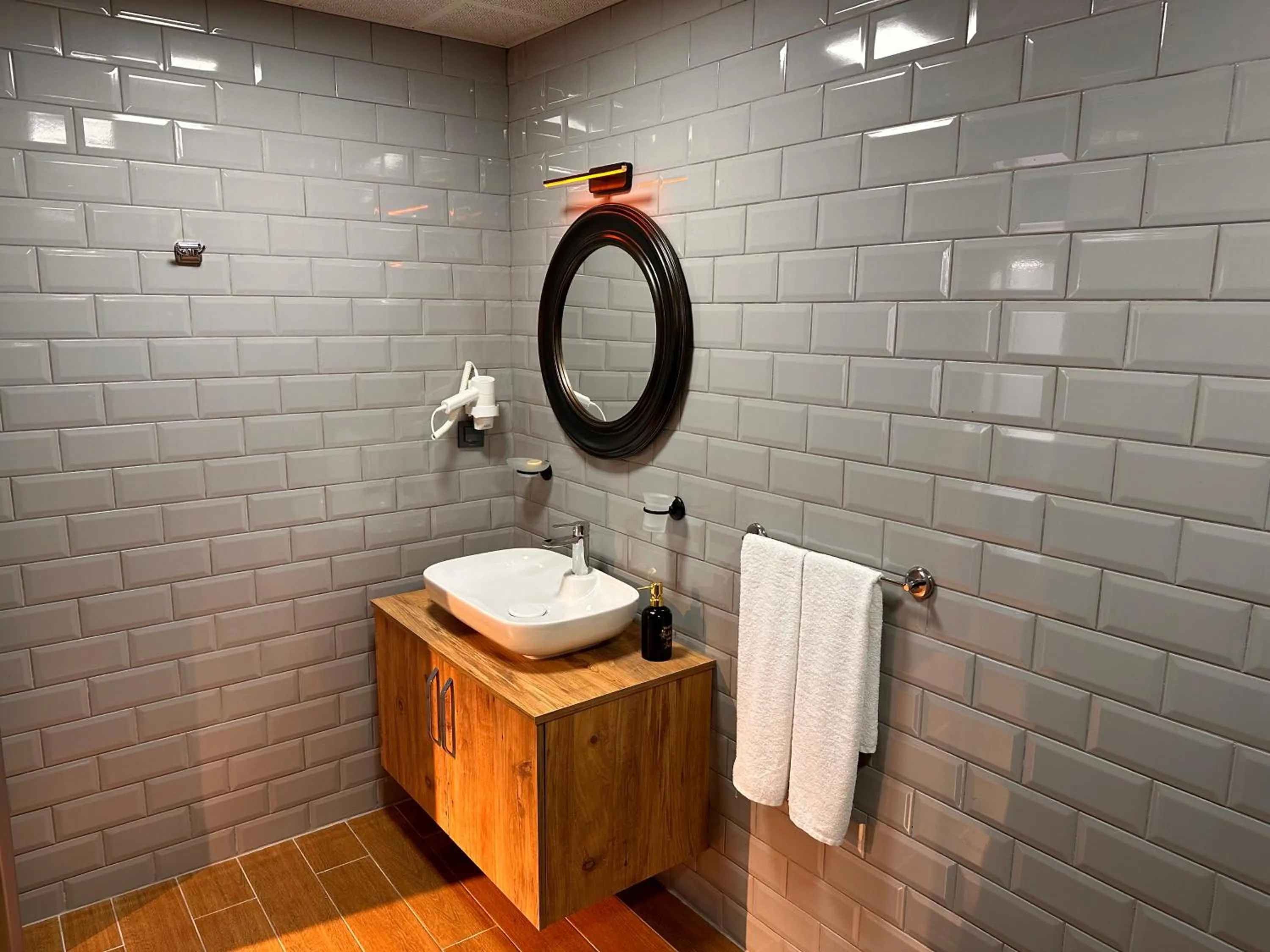 Bathroom in KA Hotel & Suites