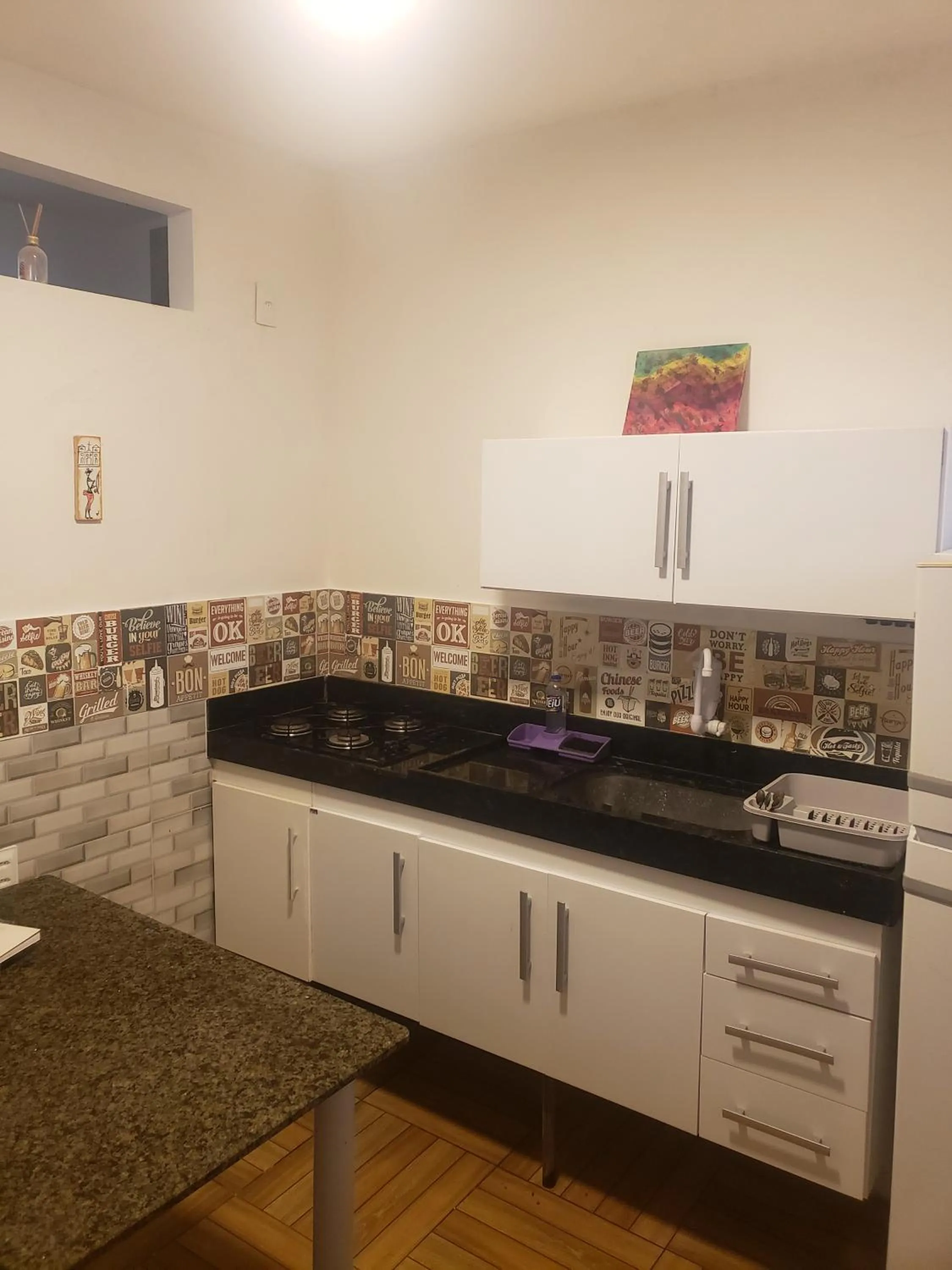 Kitchen or kitchenette in Kitnet Perto da Primeira Praia