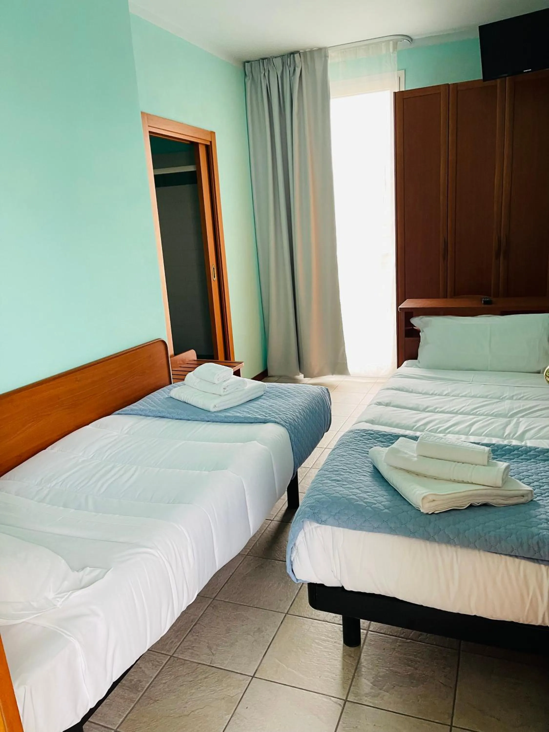 Bed in Hotel Blue Moon