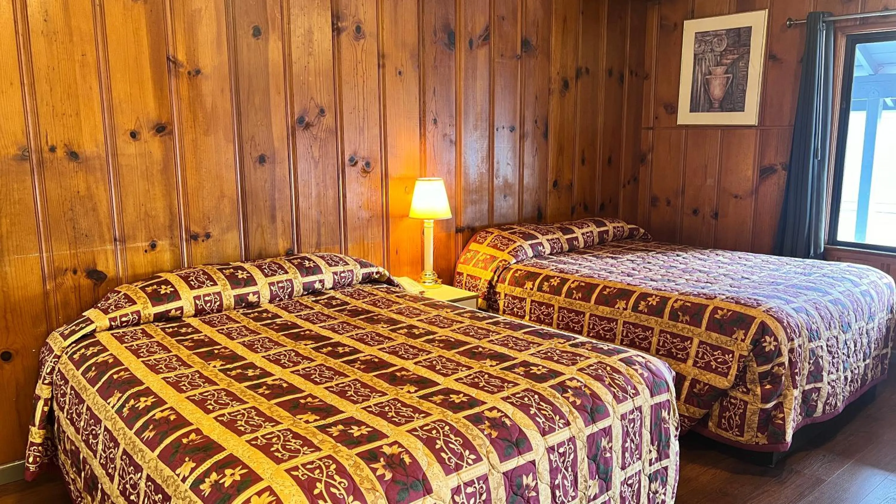 Bed in Pine Cone Motel