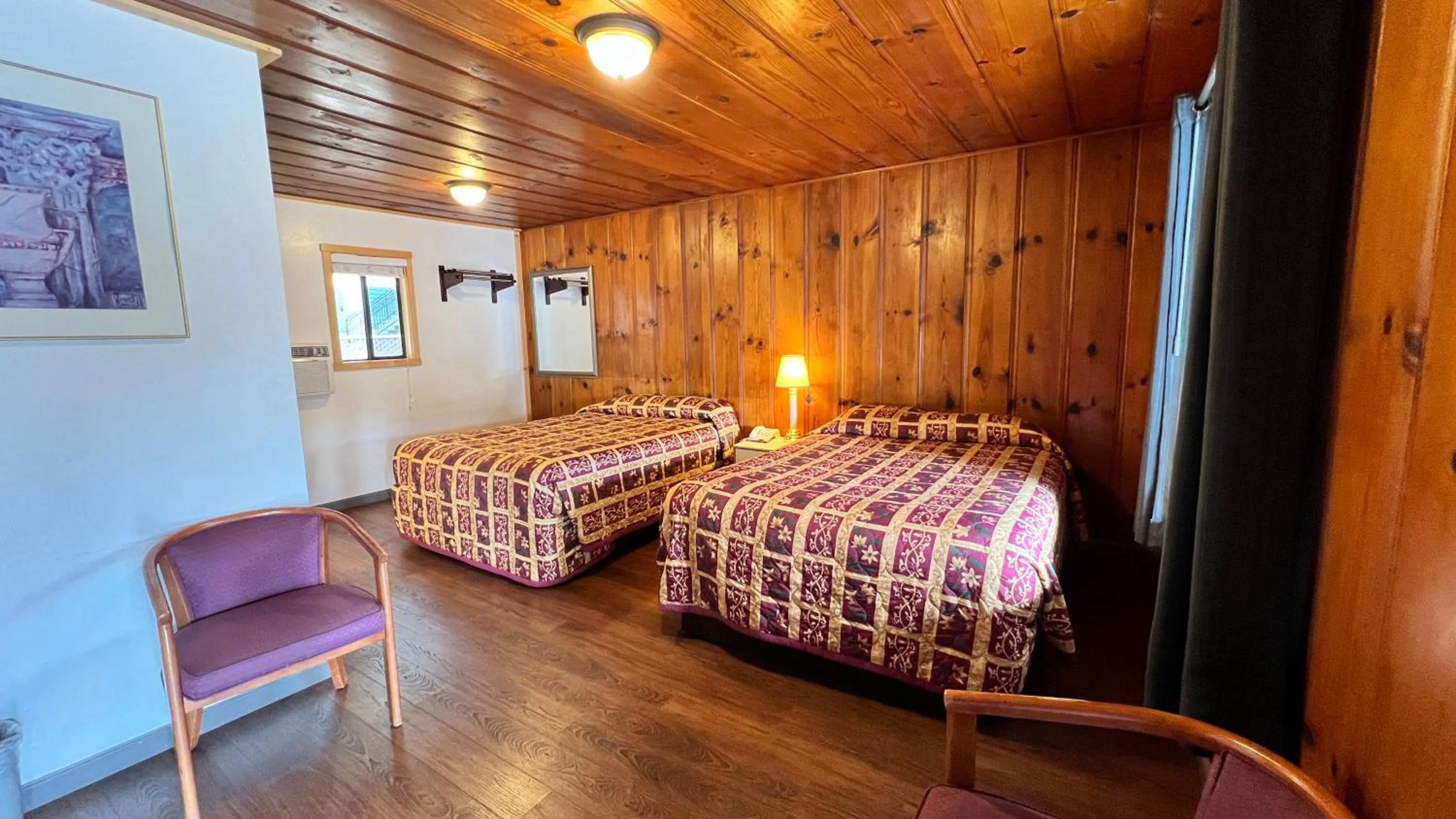 Bed in Pine Cone Motel