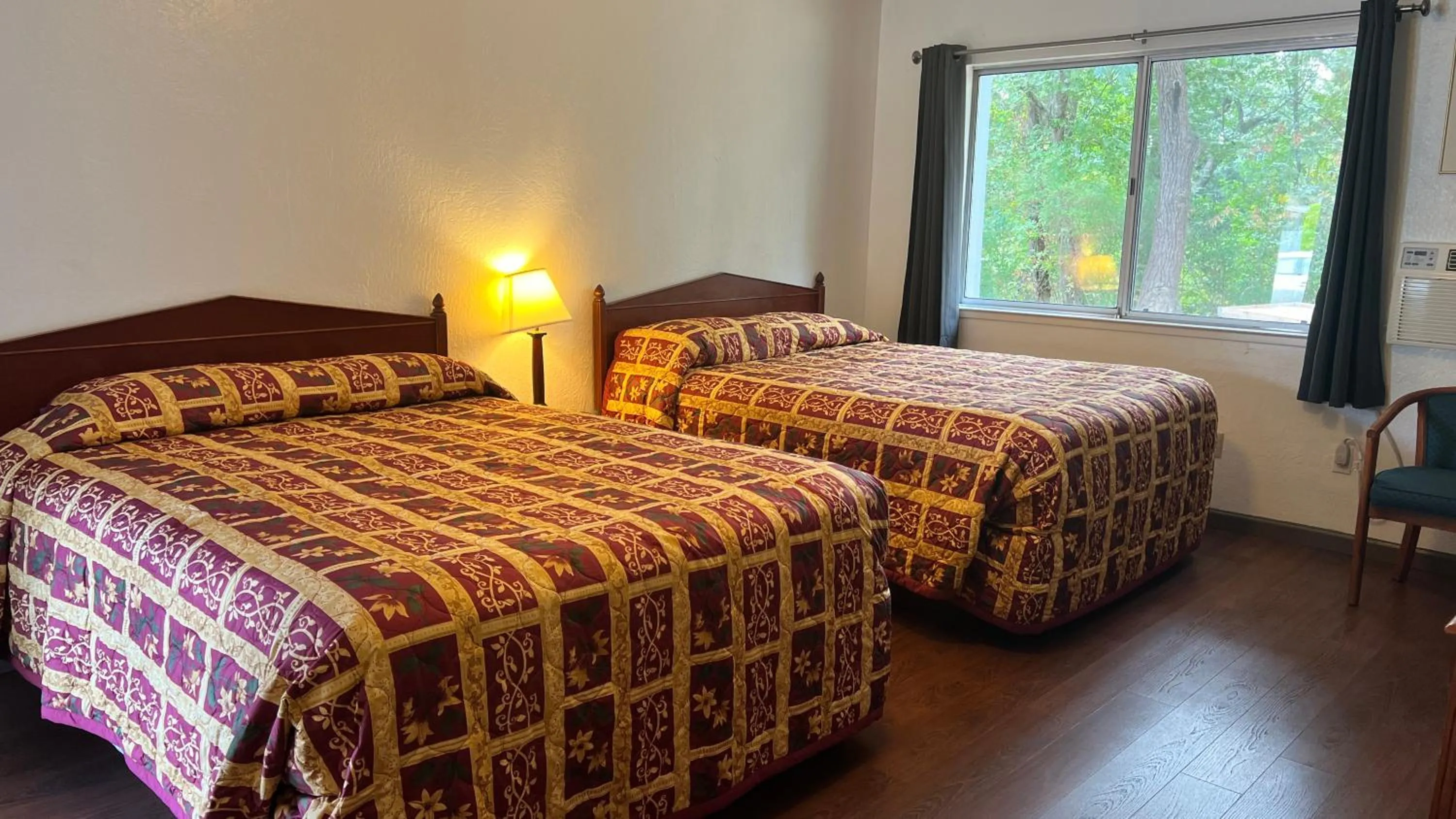 Bed in Pine Cone Motel