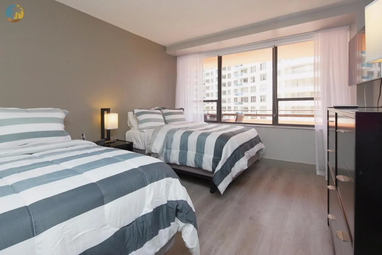 Bed in Deluxe Beach Resort - HORA RENTALS