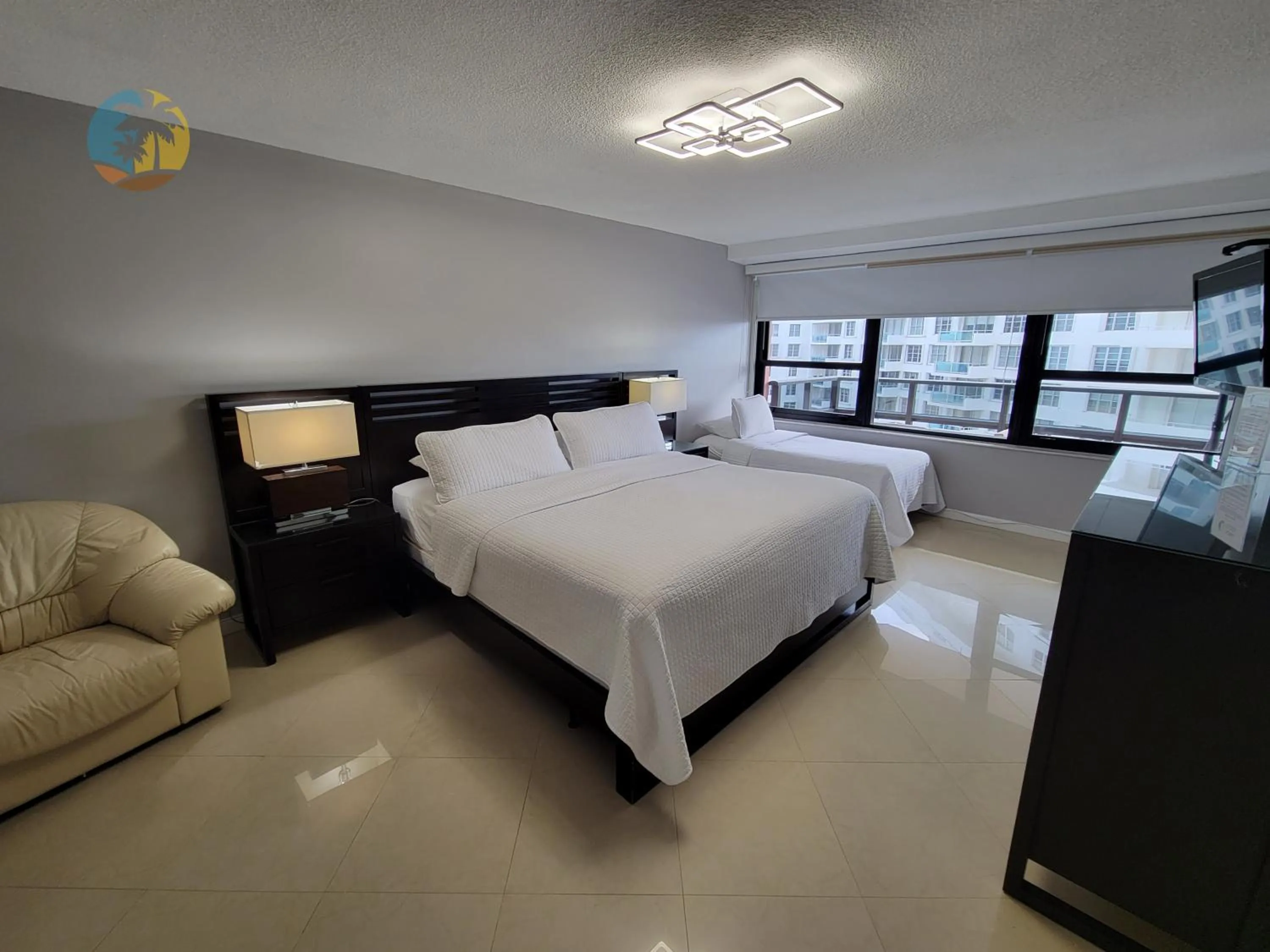 Bed in Deluxe Beach Resort - HORA RENTALS