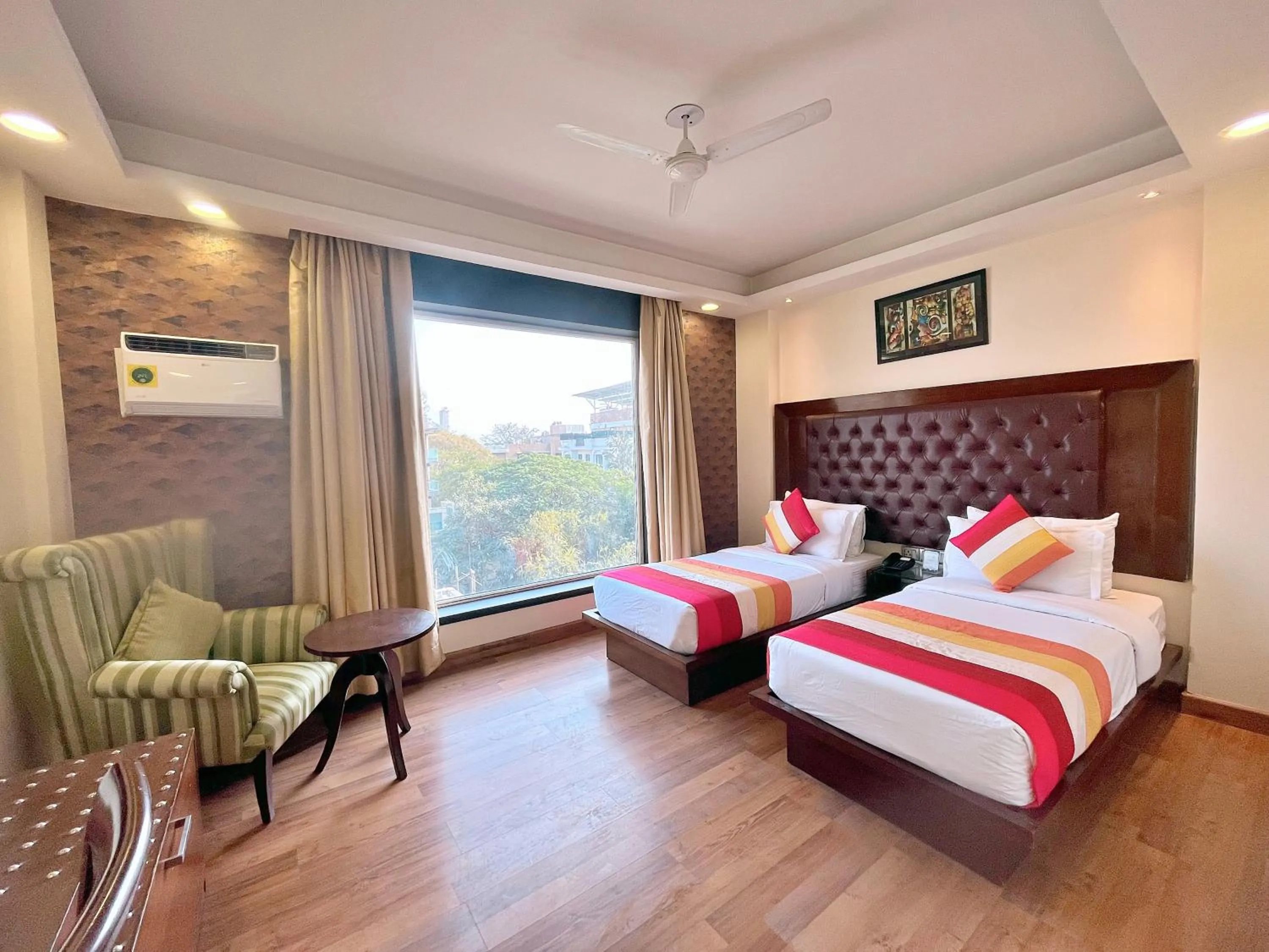 Photo of the whole room, Bed in The Grand Orion - Kailash Colony