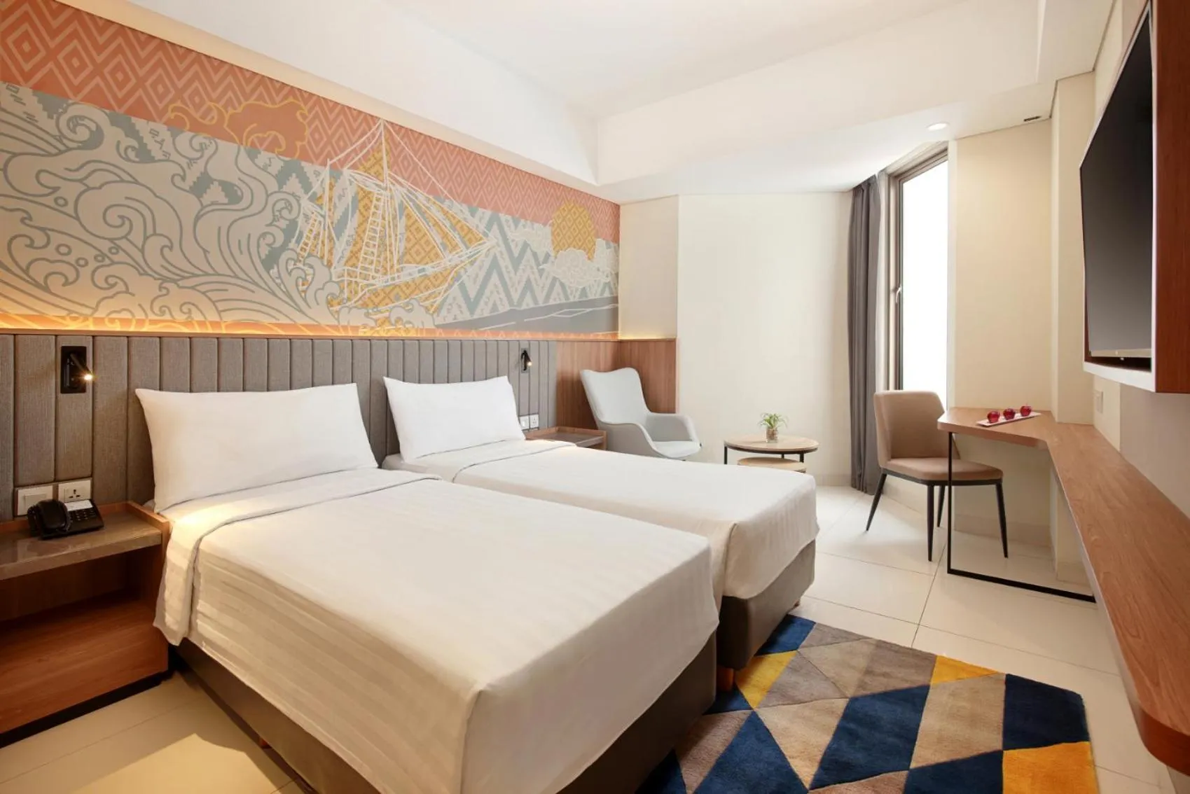 Bed in Aston Inn Pantai Losari Makassar