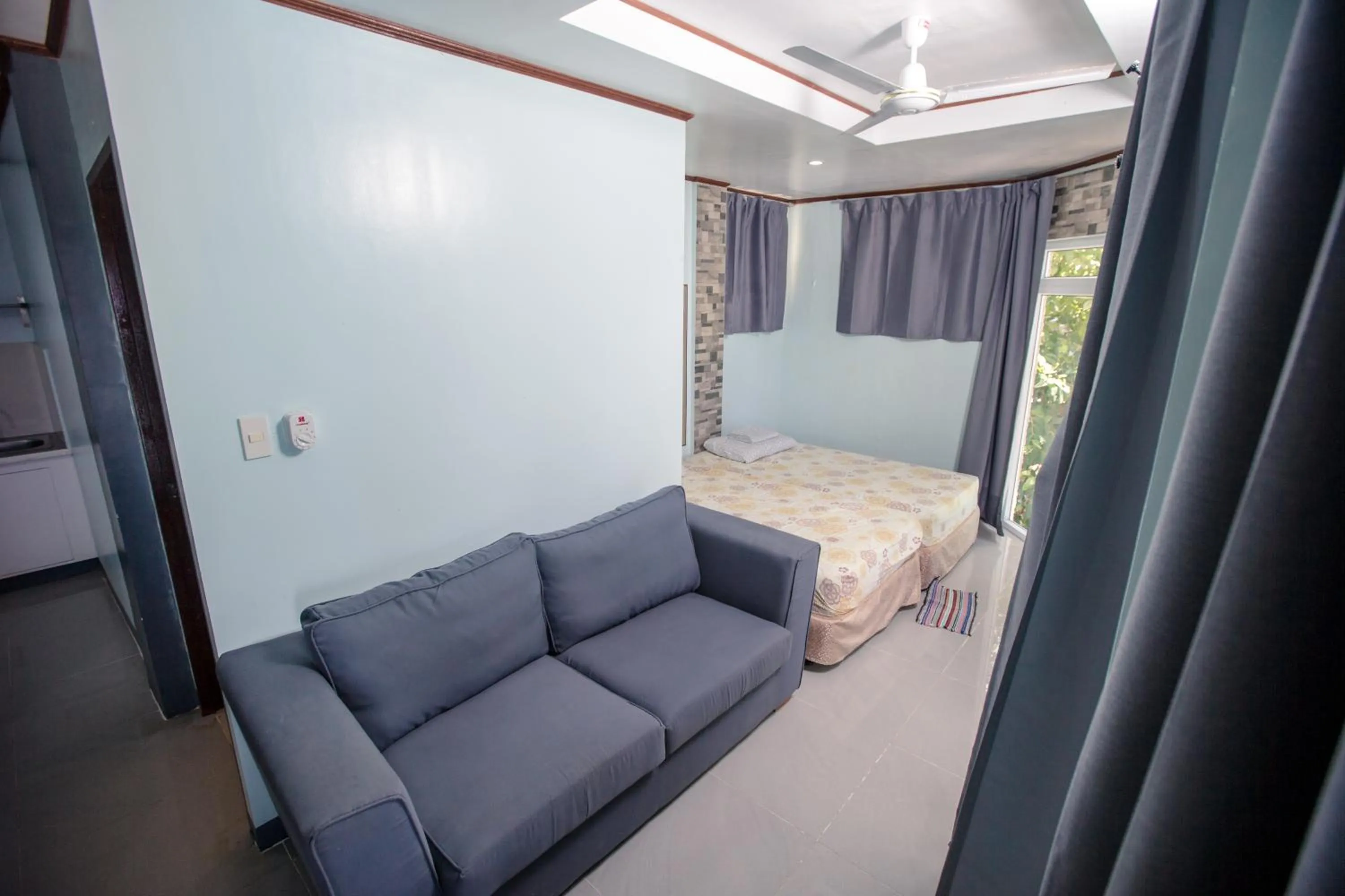 Living room, Bed in Oslob Seafari Resort