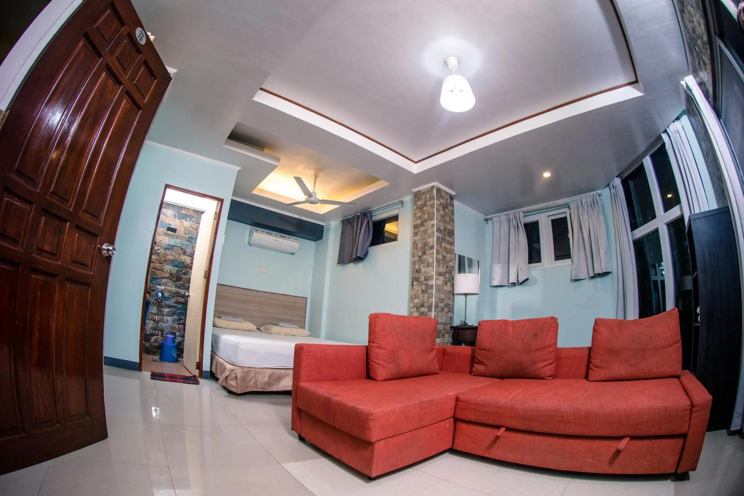 Living room, Bed in Oslob Seafari Resort