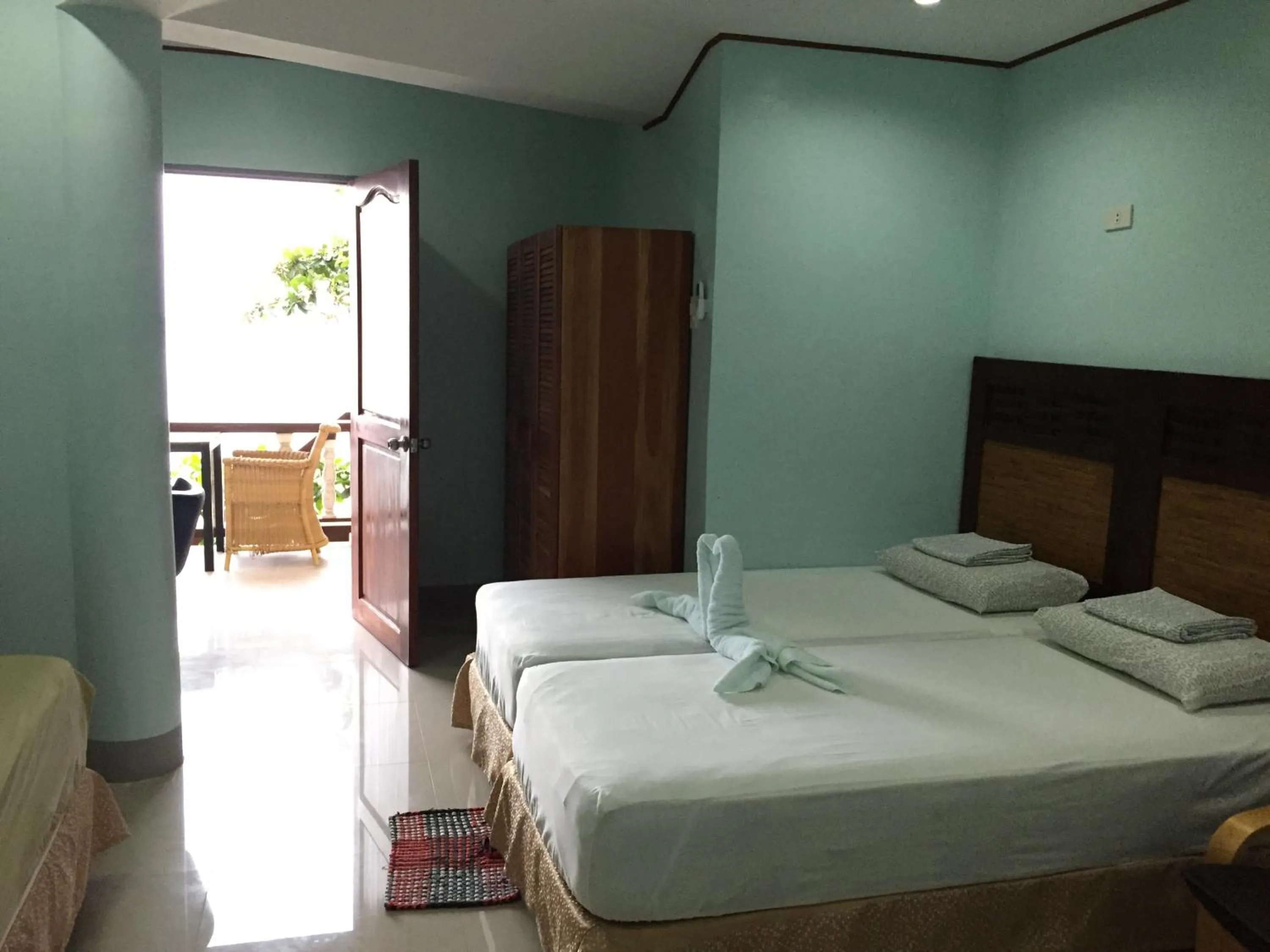 Bed in Oslob Seafari Resort