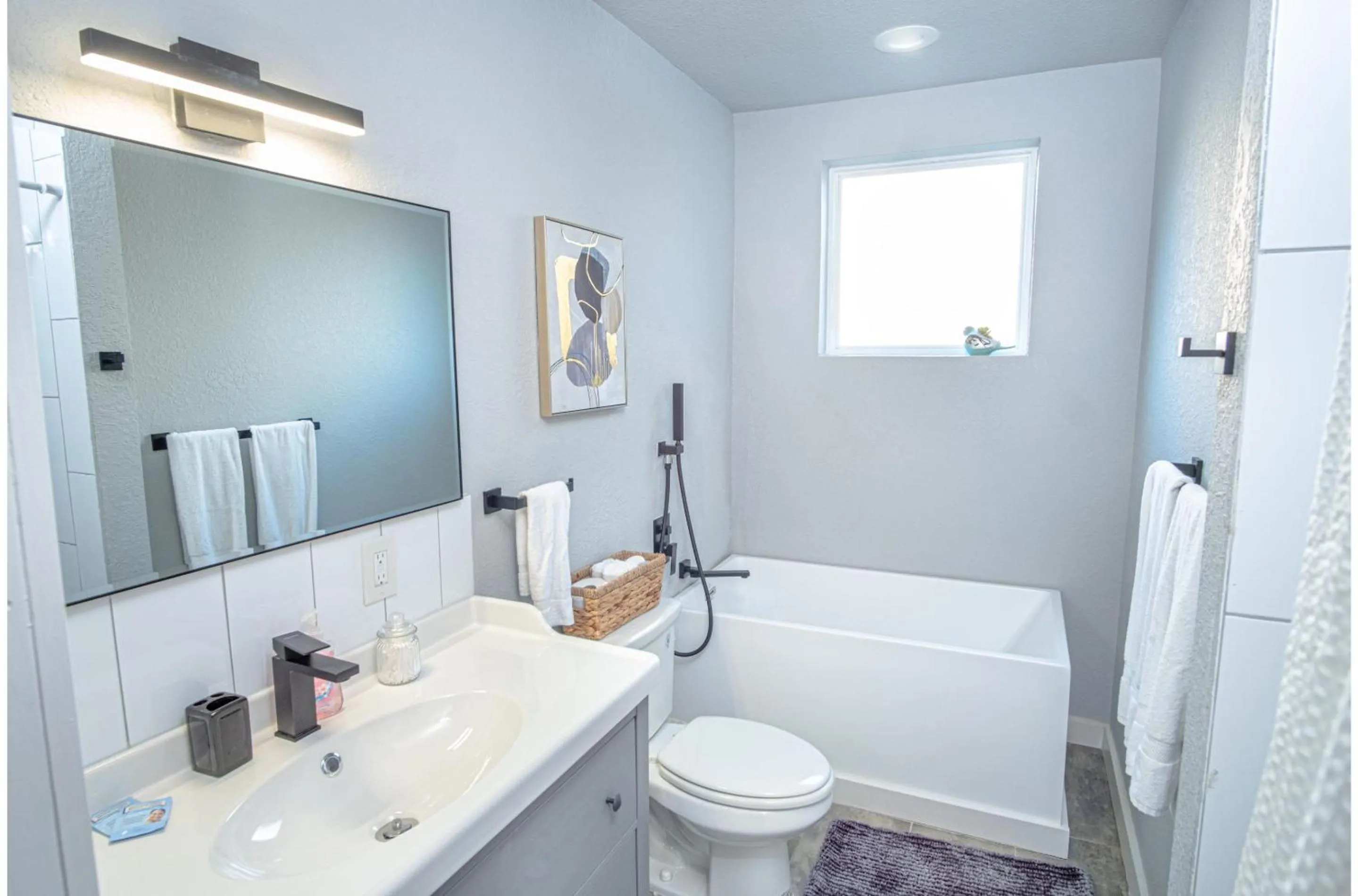 Bathroom in Stylish 4 Br2Ba Renovated Home Near Downtown