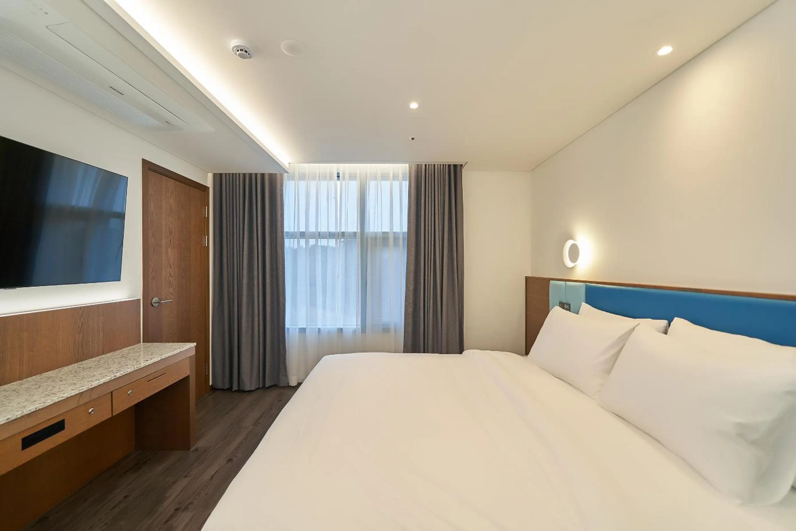 Bed in JN PARK Hotel