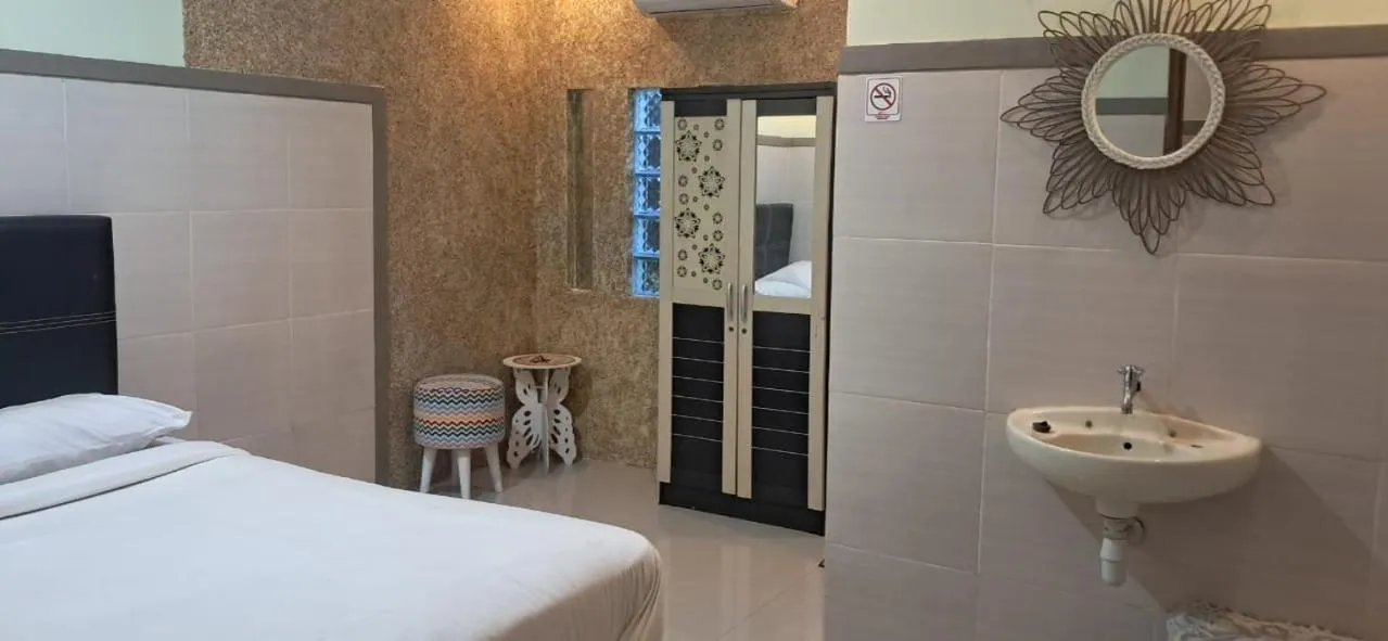 Bed in CALDERA PARK HOMESTAY Syariah