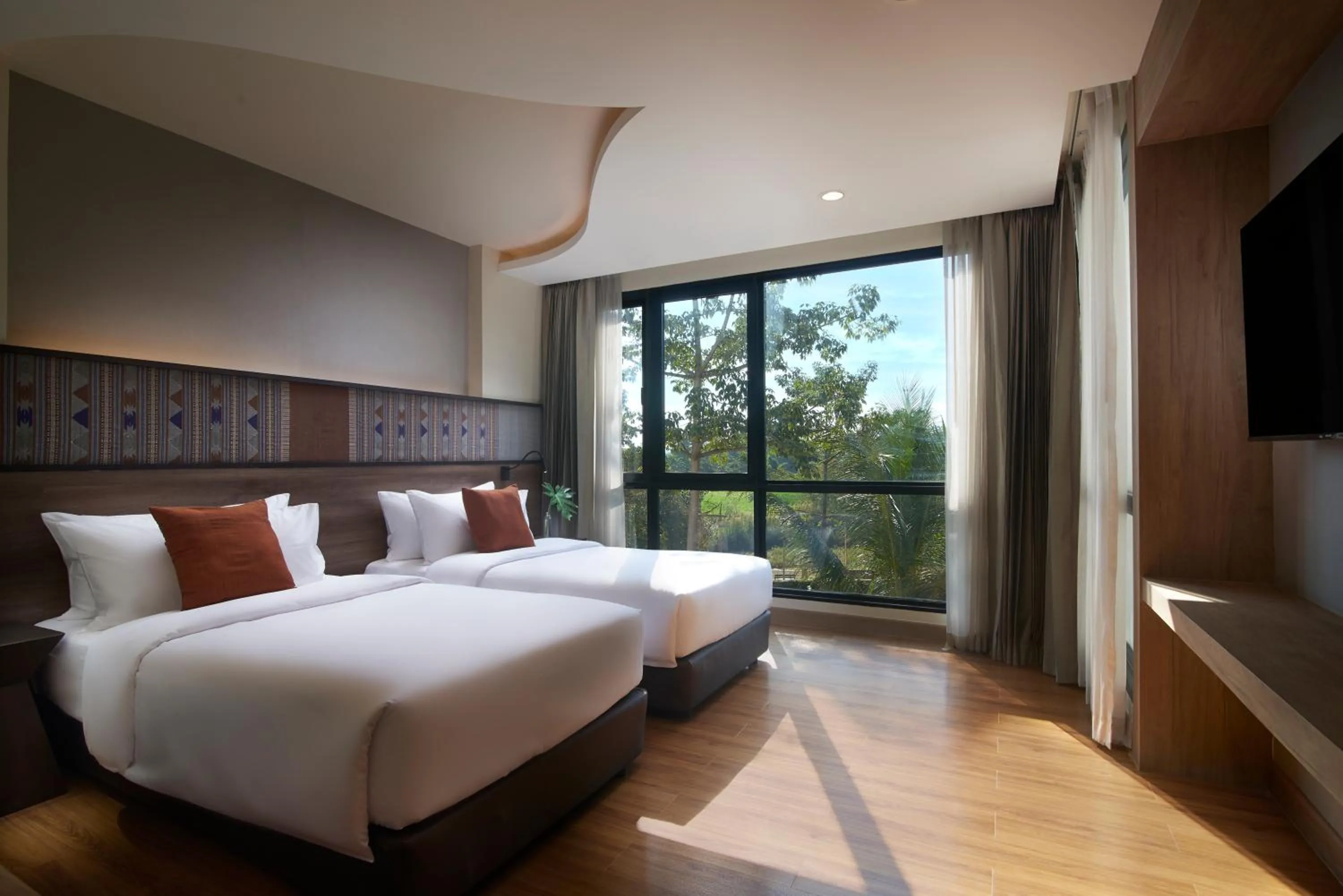 Bed in Emmaline Hotel Nan