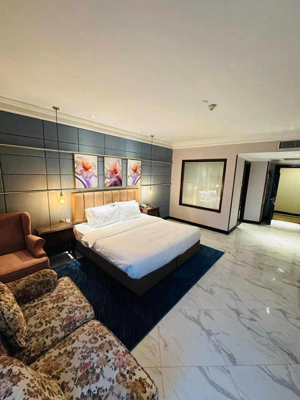 Bedroom, Bed in The Convention Center & Royal Suites Hotel