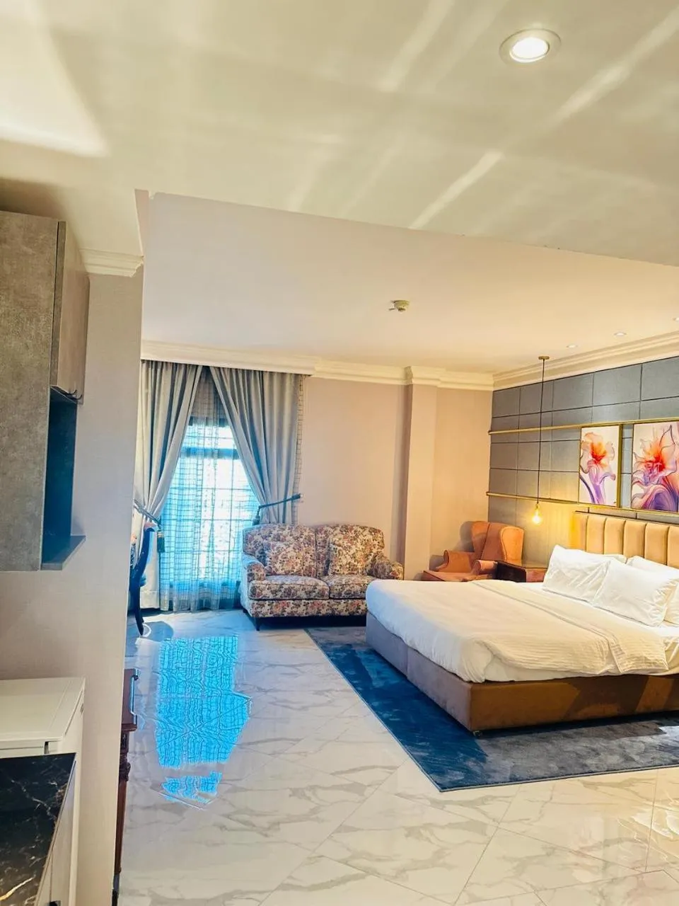 Bedroom, Bed in The Convention Center & Royal Suites Hotel