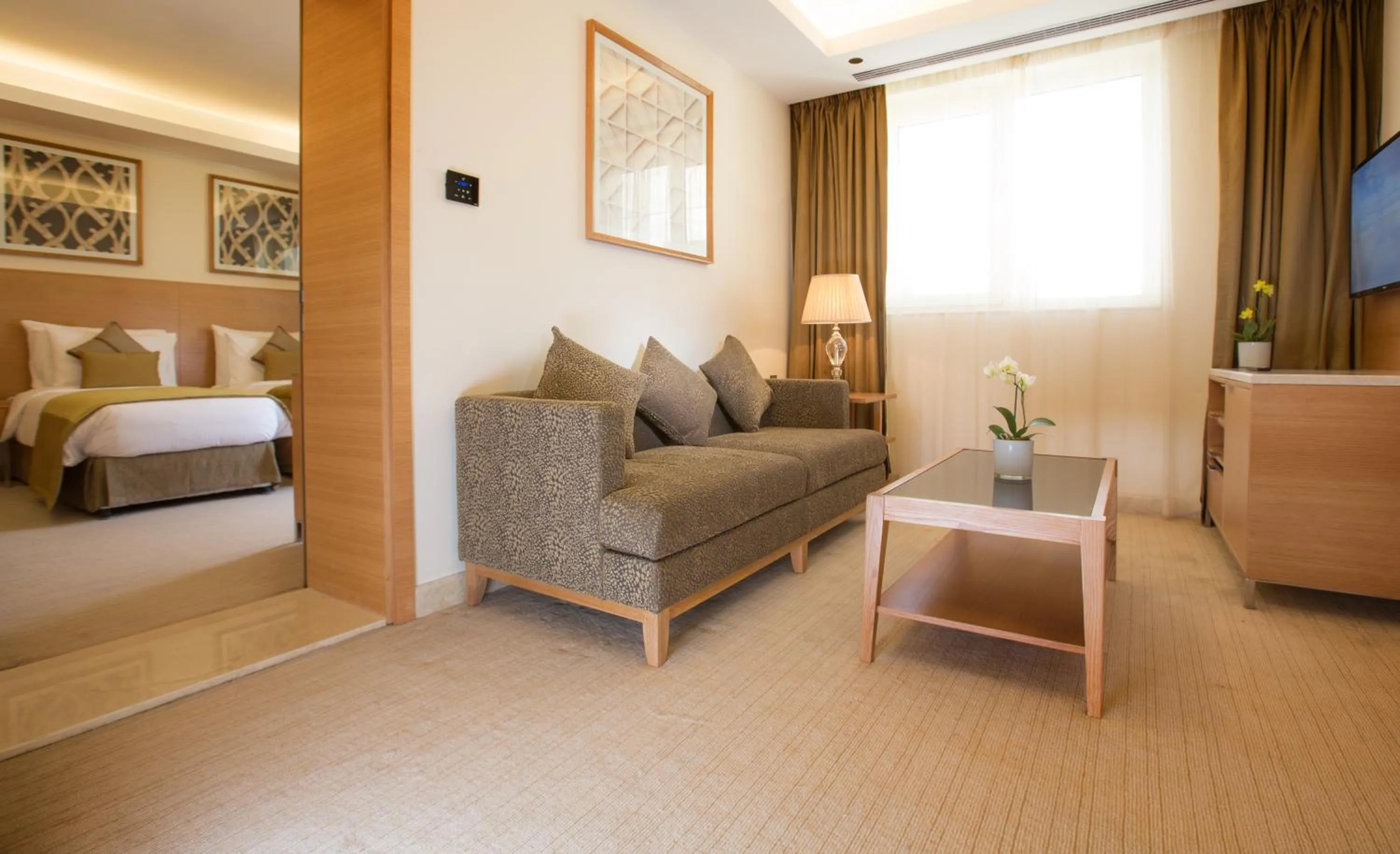 Seating area, Bed in Millennium Kurdistan Hotel & Spa