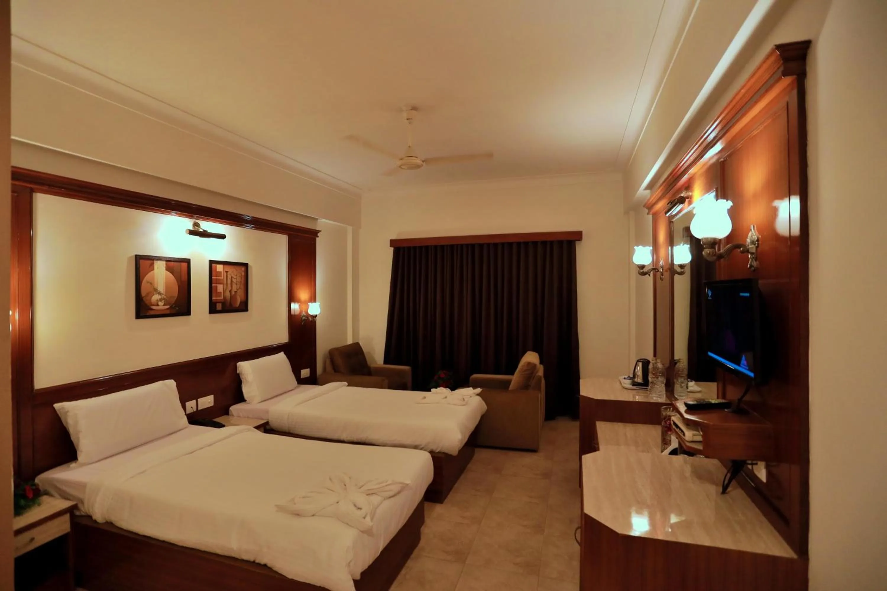 Bed in Hotel Edassery Mansion