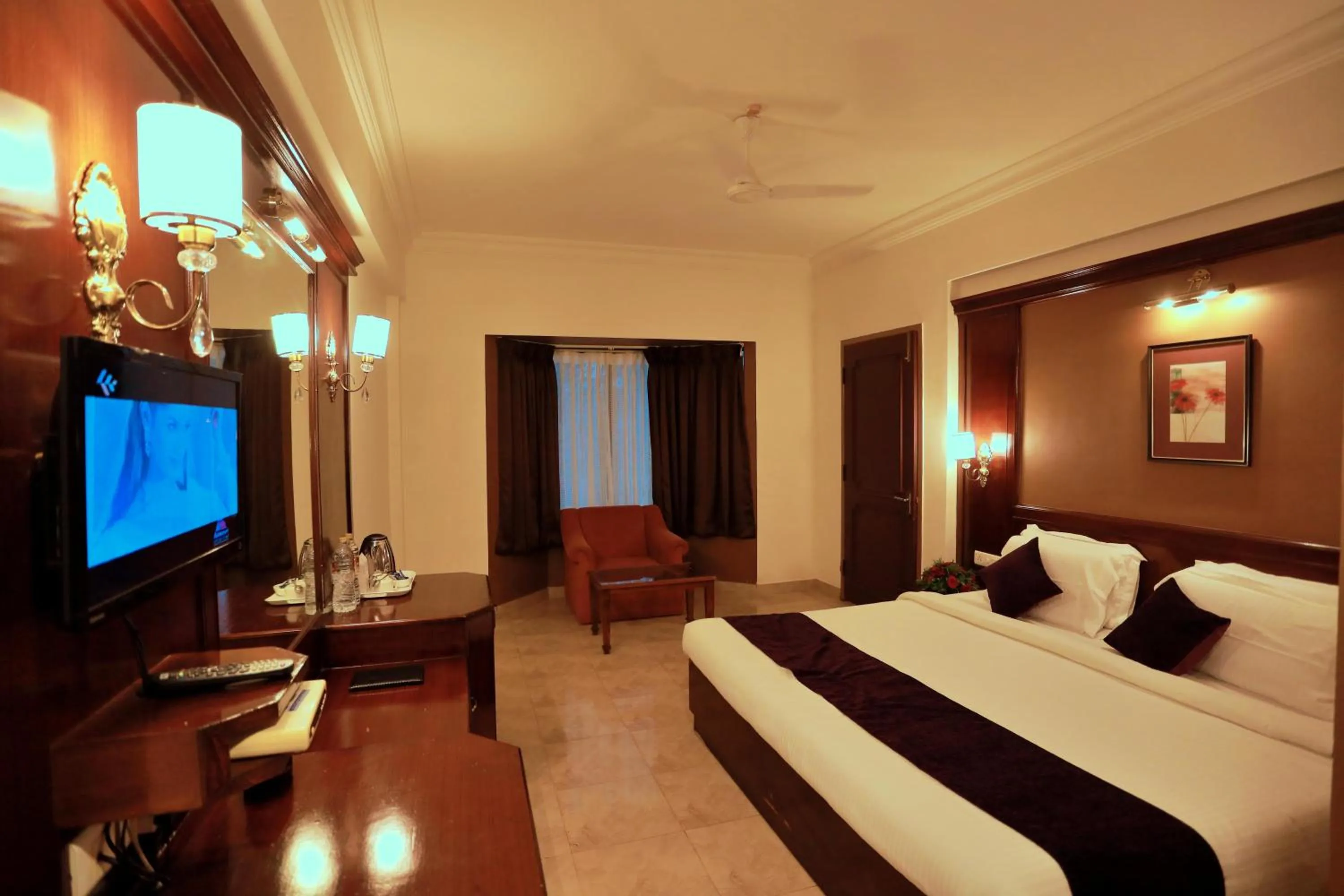 TV and multimedia, Bed in Hotel Edassery Mansion