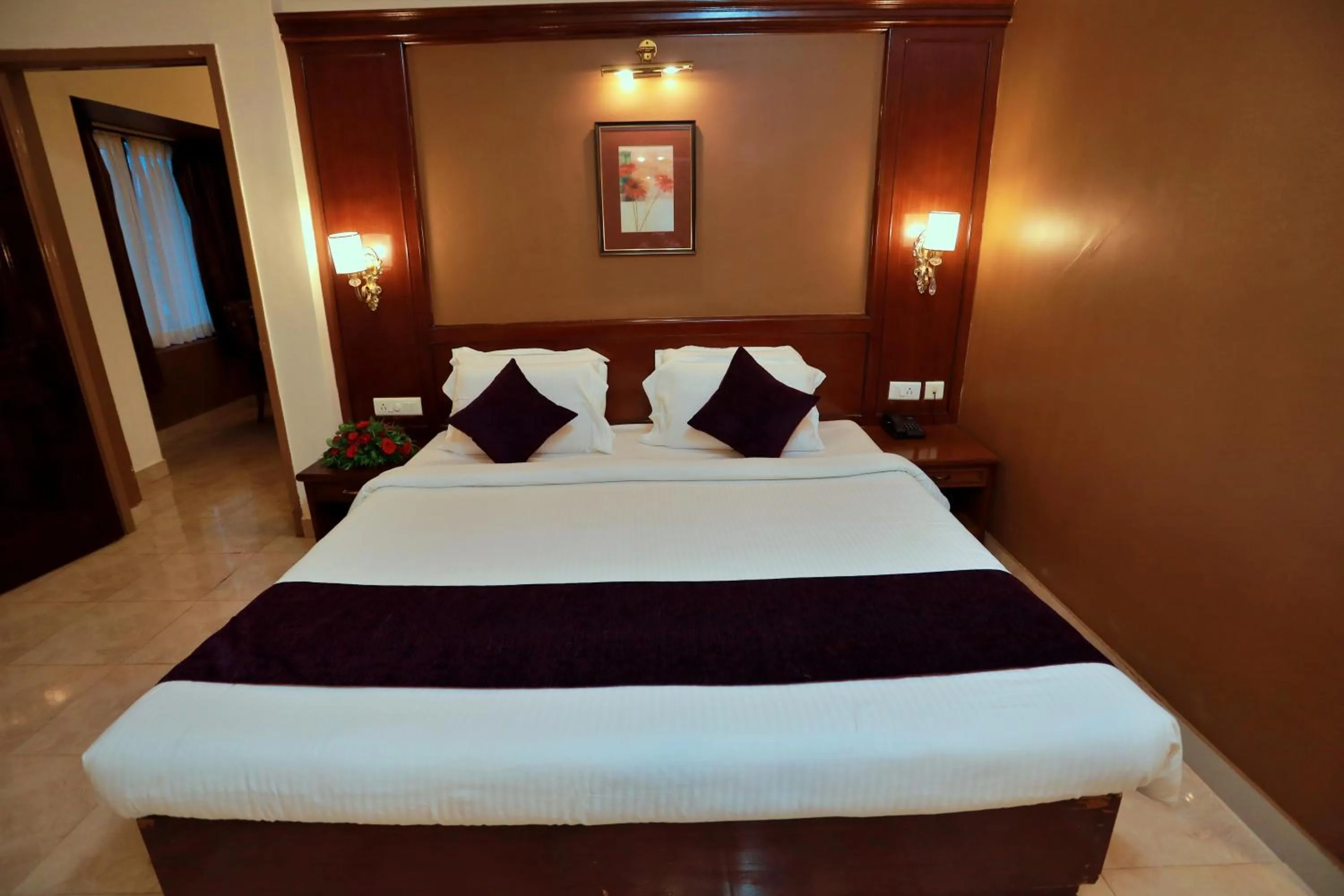 Bed in Hotel Edassery Mansion