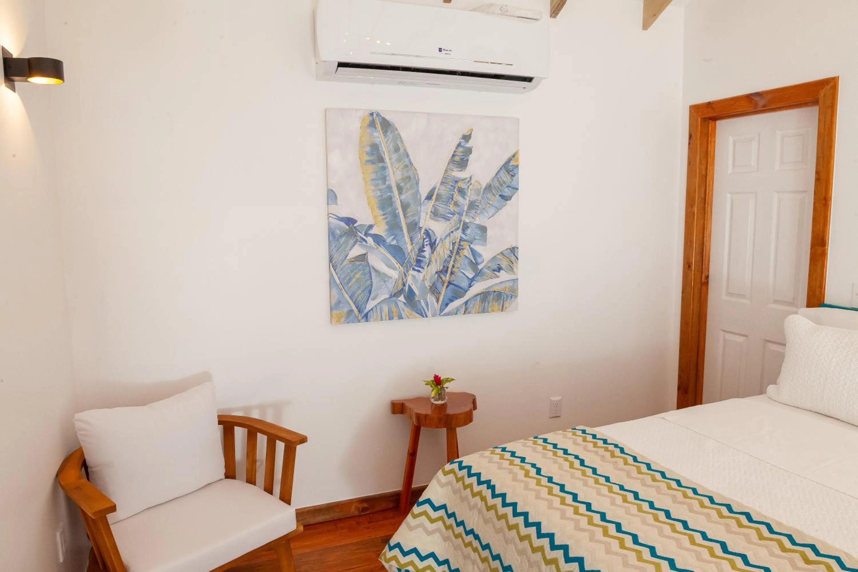 Seating area, Bed in Angeli Gardens Boutique Hotel