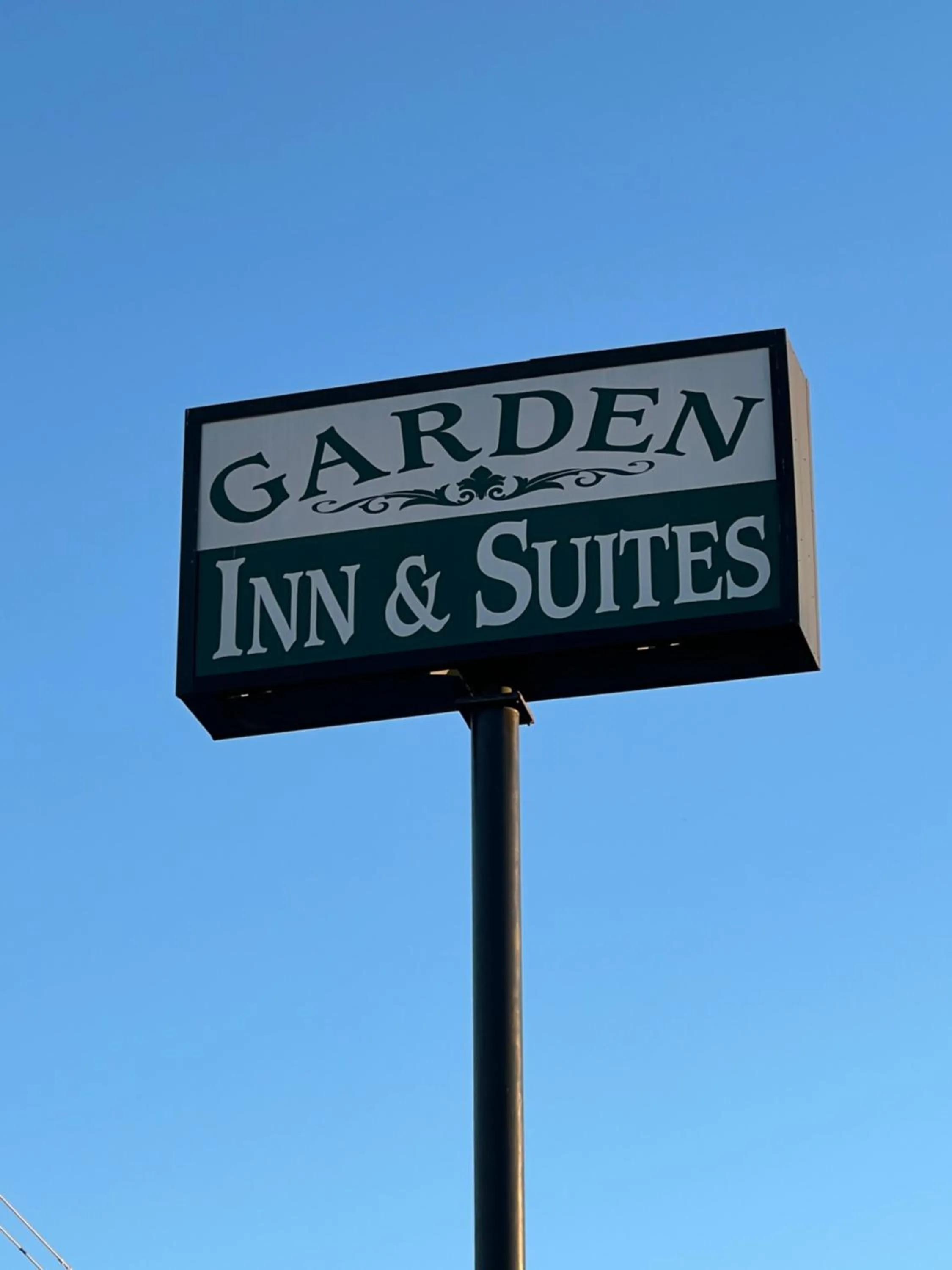 Logo/Certificate/Sign in Garden Inn & Suites