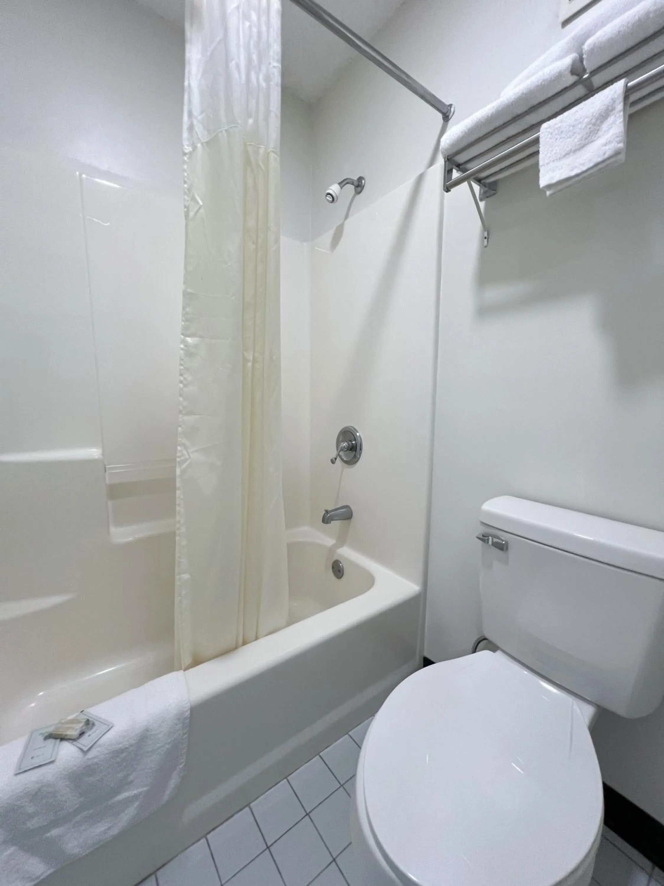 Bathroom in Garden Inn & Suites