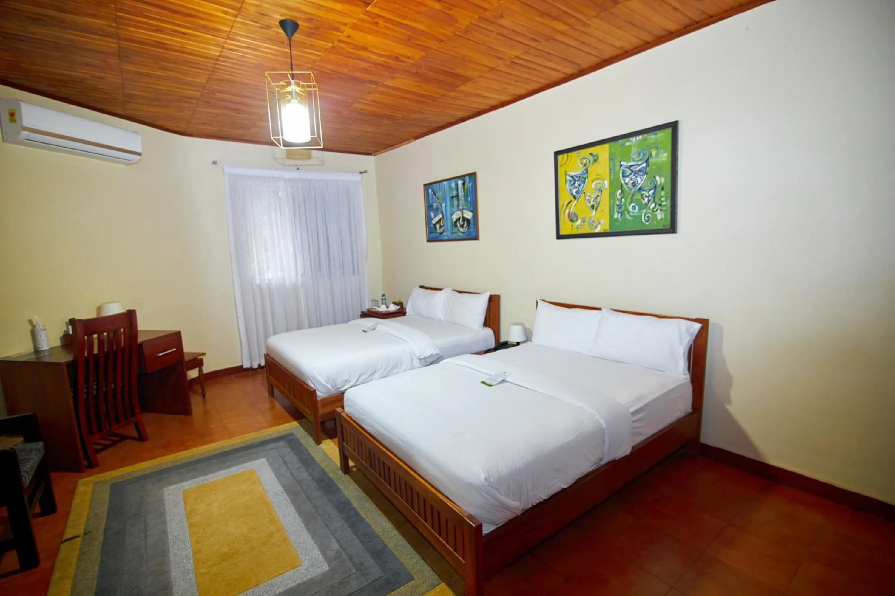 Bed in The Haven Boutique Hotel