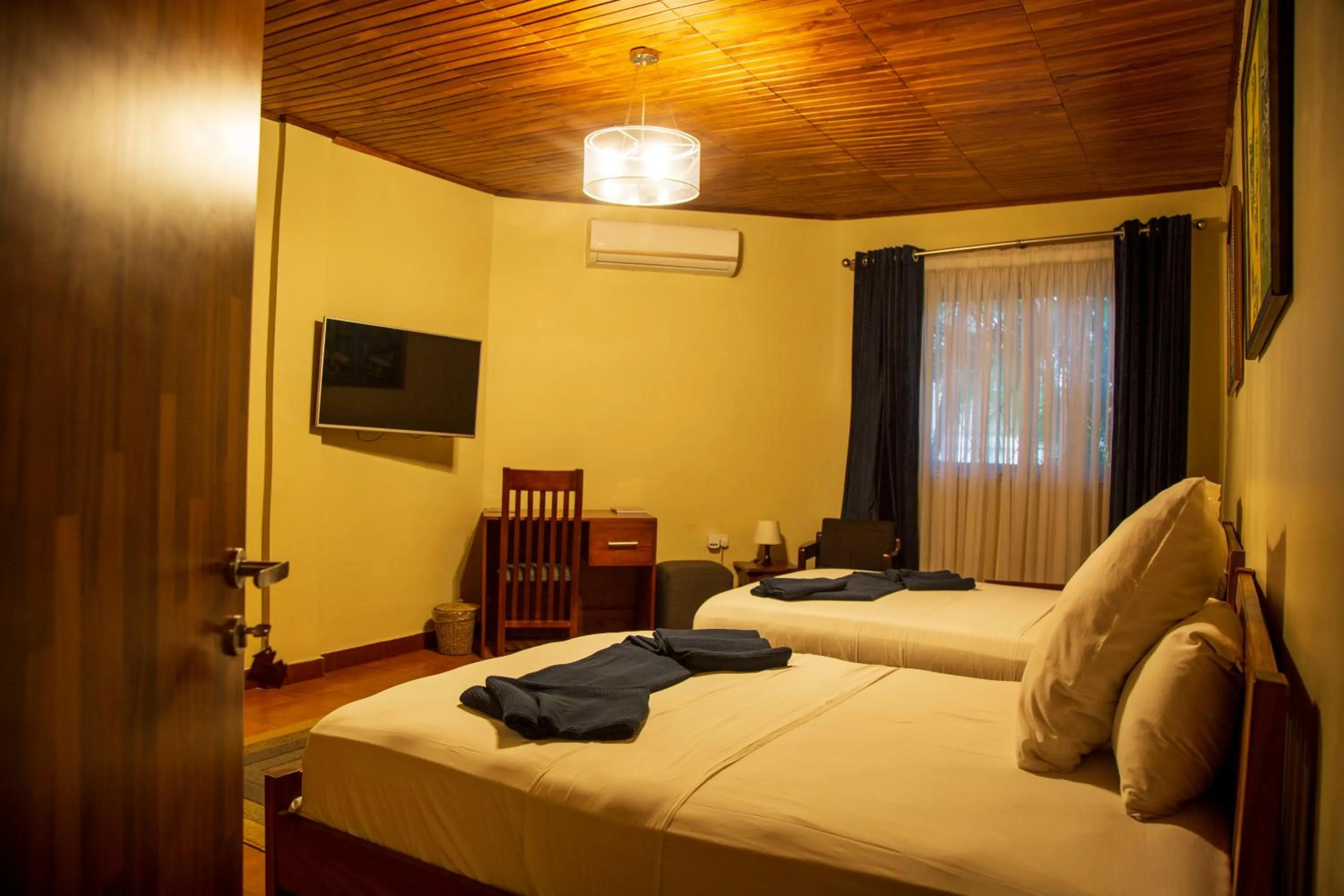 Bed in The Haven Boutique Hotel