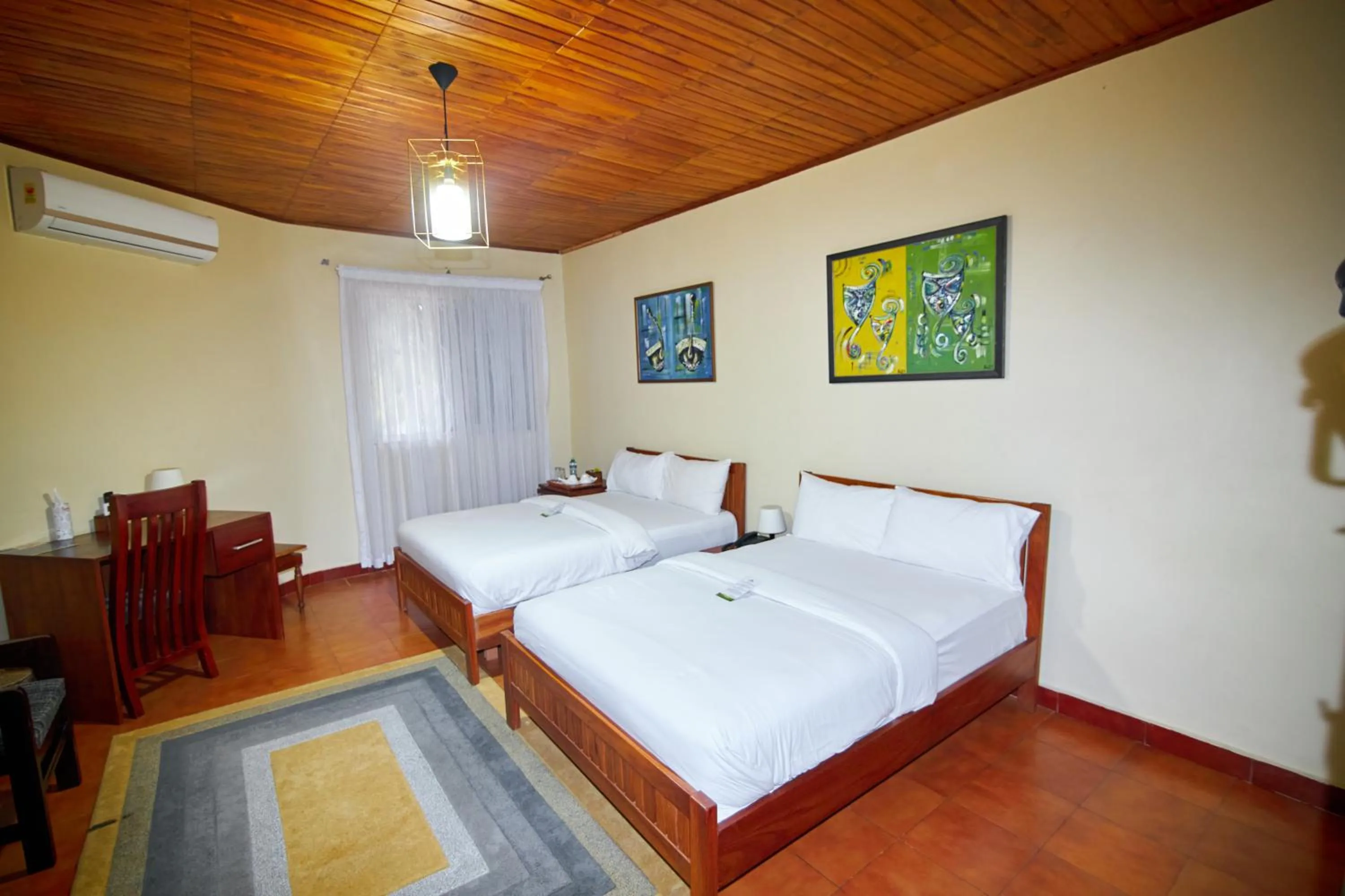 Bed in The Haven Boutique Hotel