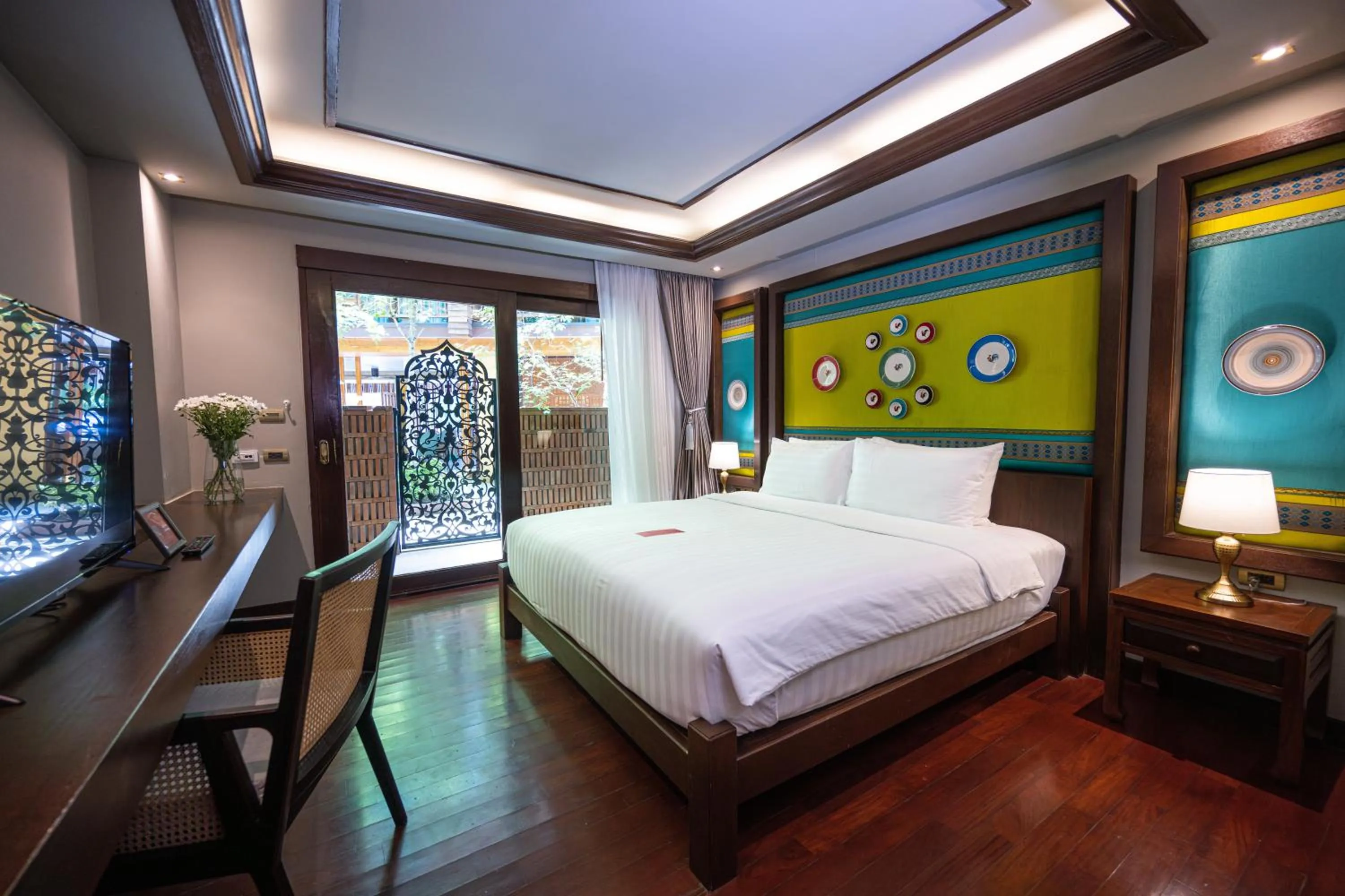 Bed in At Gate Thaphae Hotel