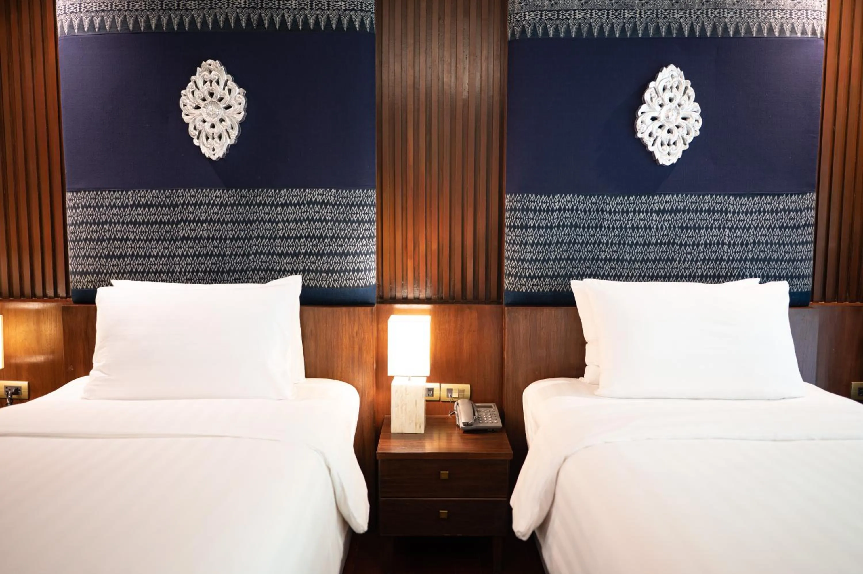 Bed in At Gate Thaphae Hotel