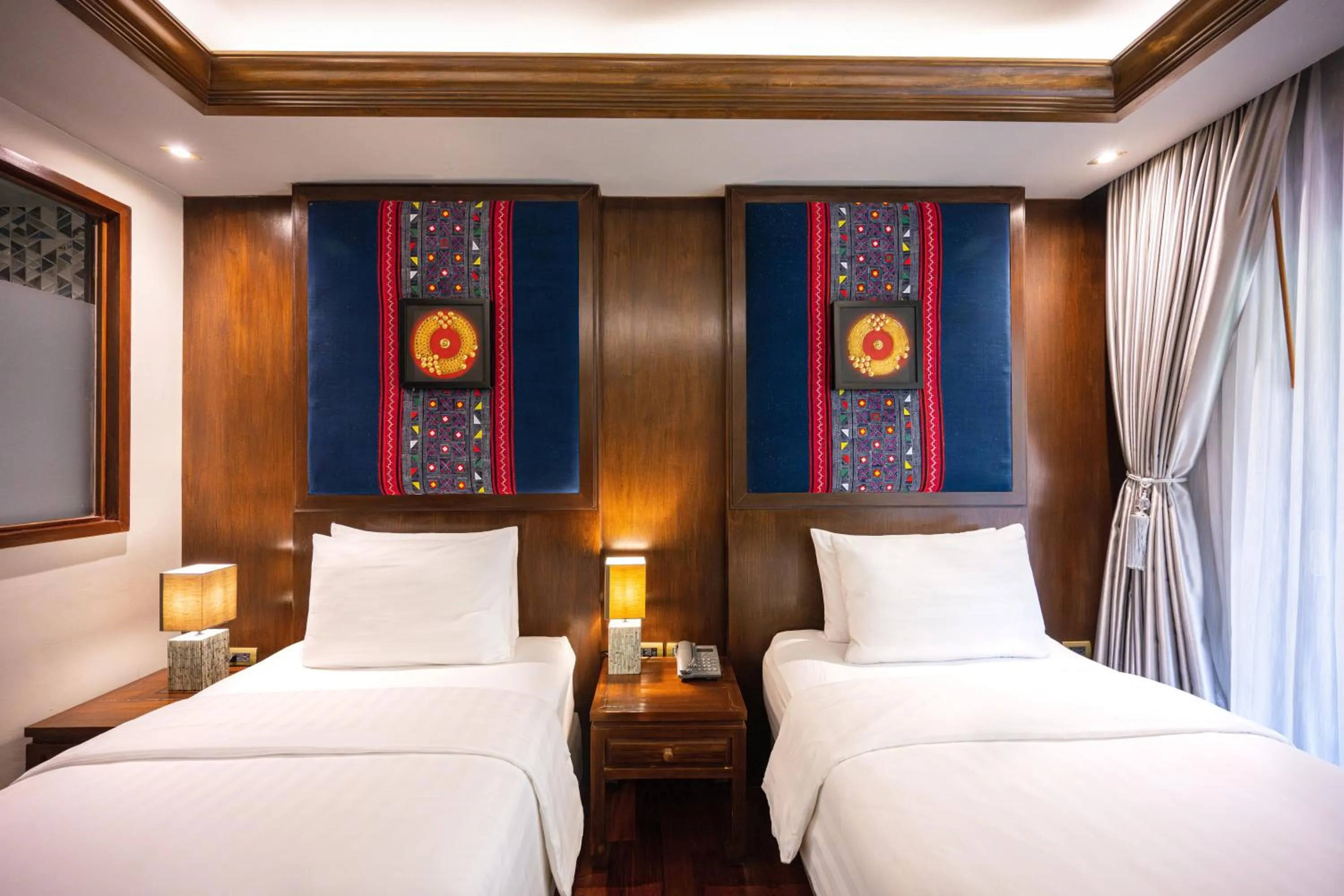 Bed in At Gate Thaphae Hotel