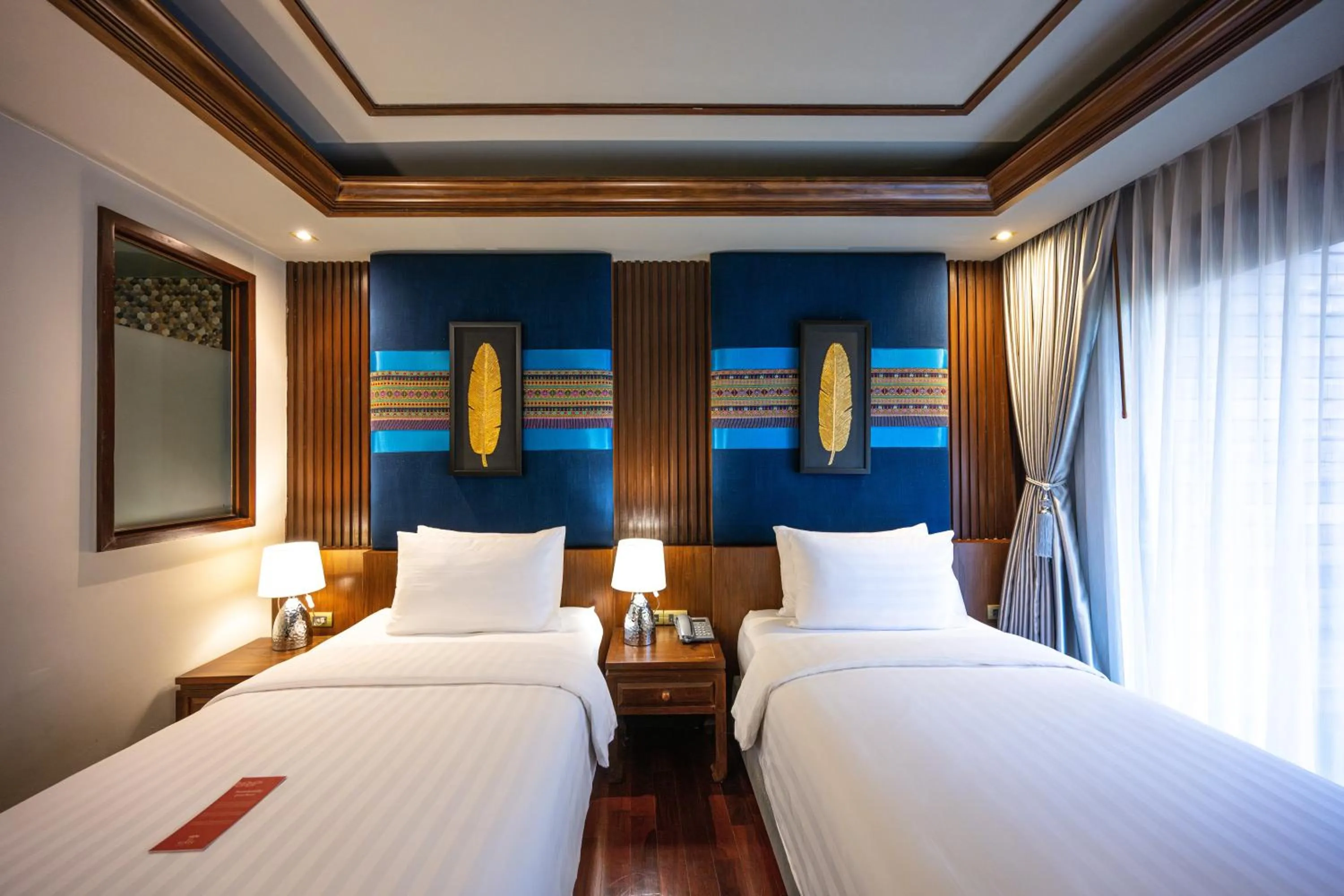 Bed in At Gate Thaphae Hotel